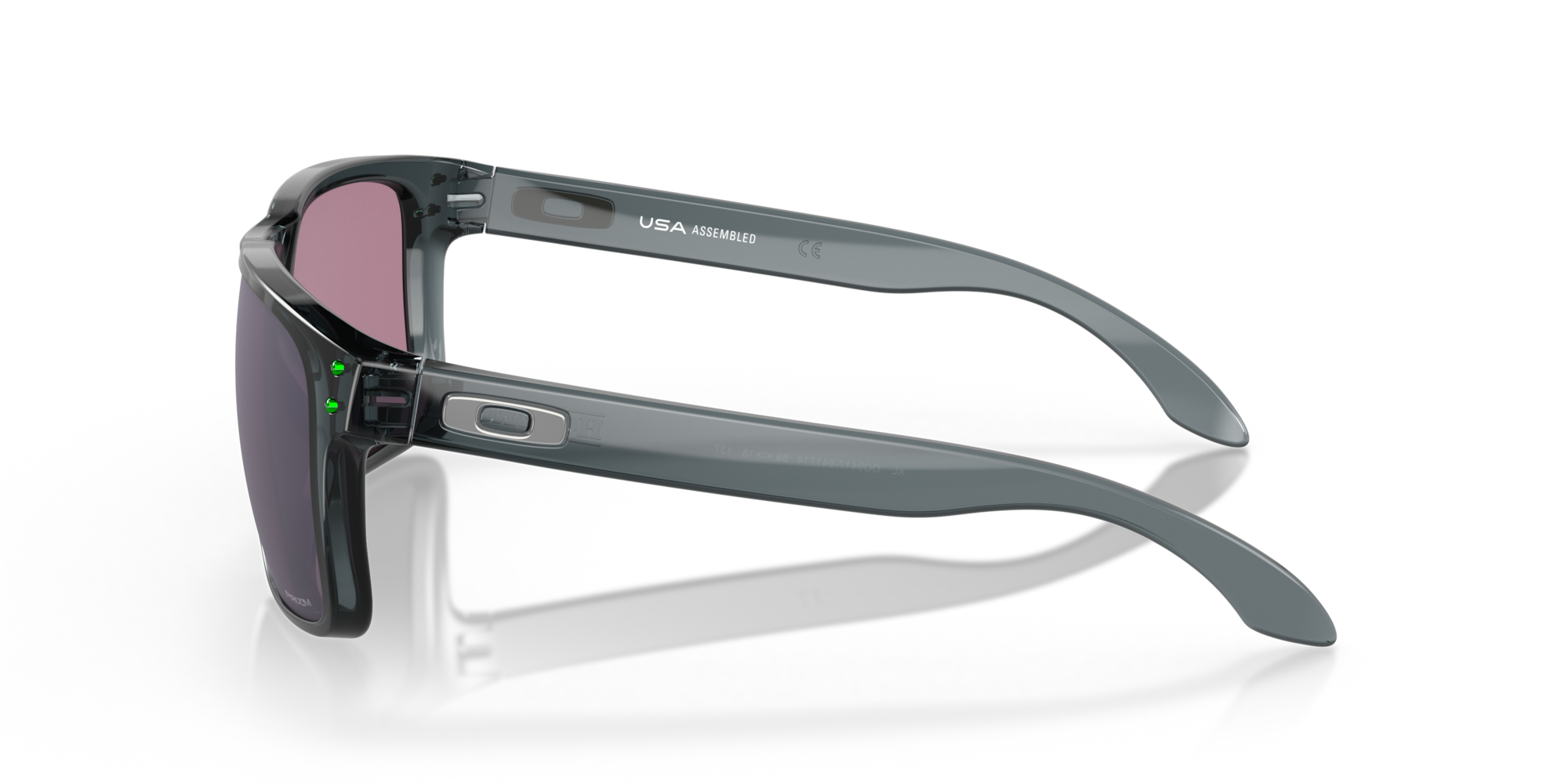 Sunglasses with gray frame and dark lenses on a white background