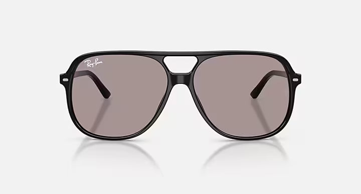 Black sunglasses with a reflective surface on a white background