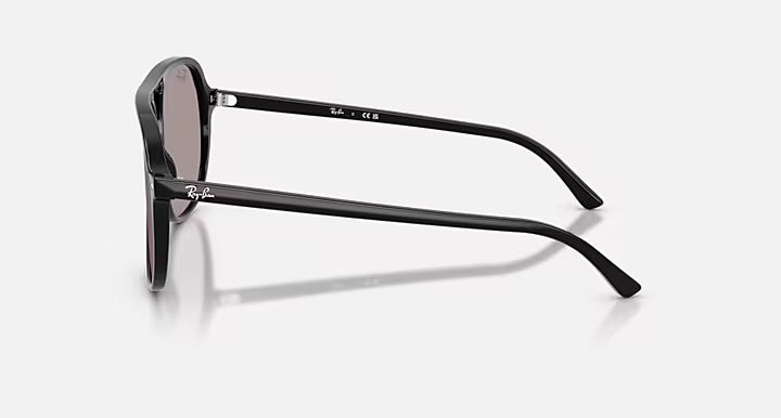 Black sunglasses with reflective lenses on a white background
