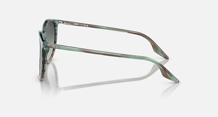 Sunglasses with a reflective surface on a white background