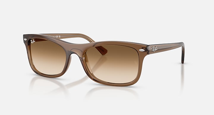 Brown sunglasses with gradient lenses on a white background