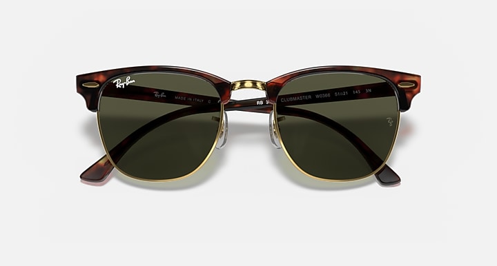 Pair of sunglasses with a tortoiseshell frame on a white background