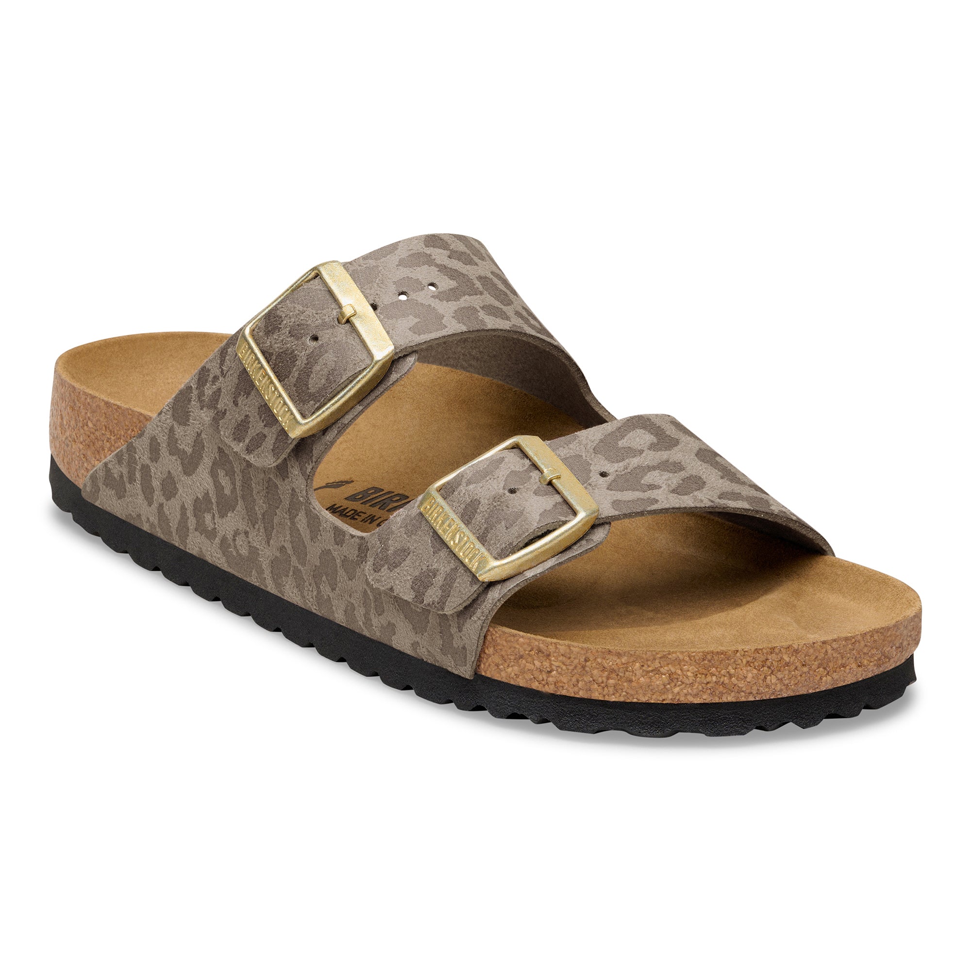 Leopard print sandal with gold buckles on a white background