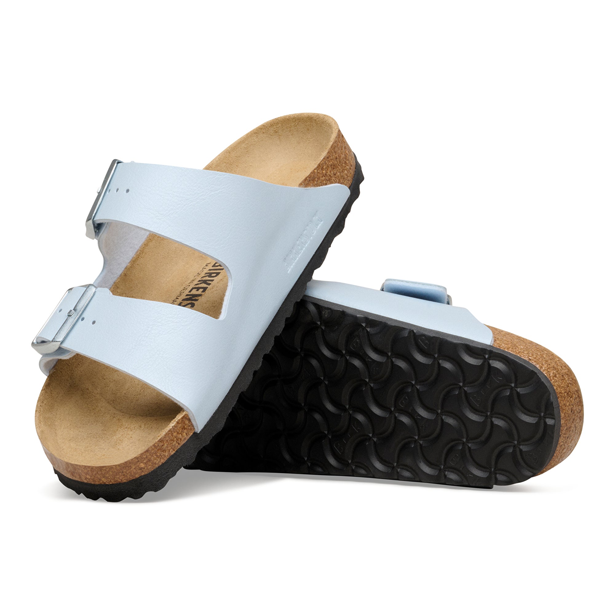 baby blue sandals with cork sole on a white background