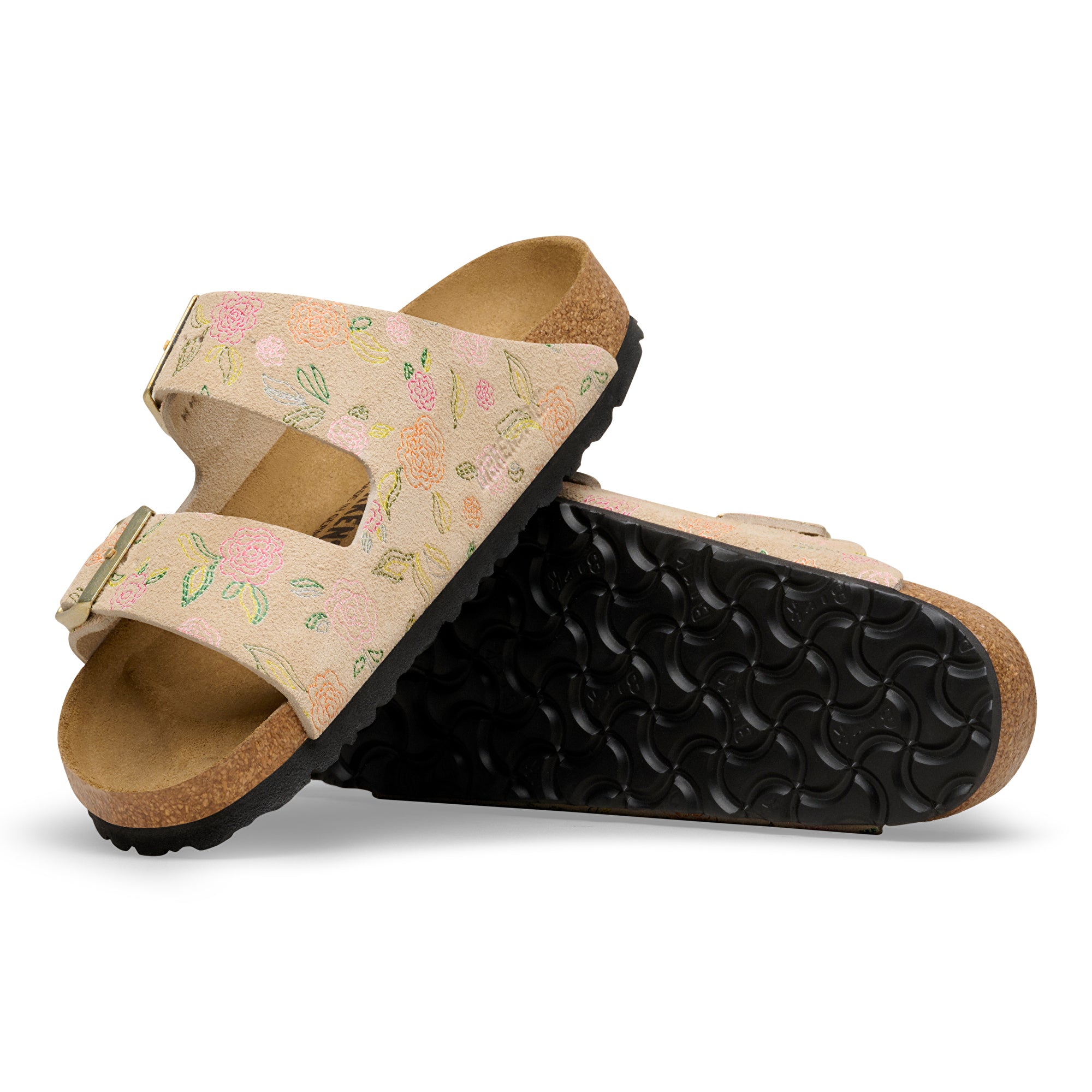 Pair of sandals with floral pattern on a white background