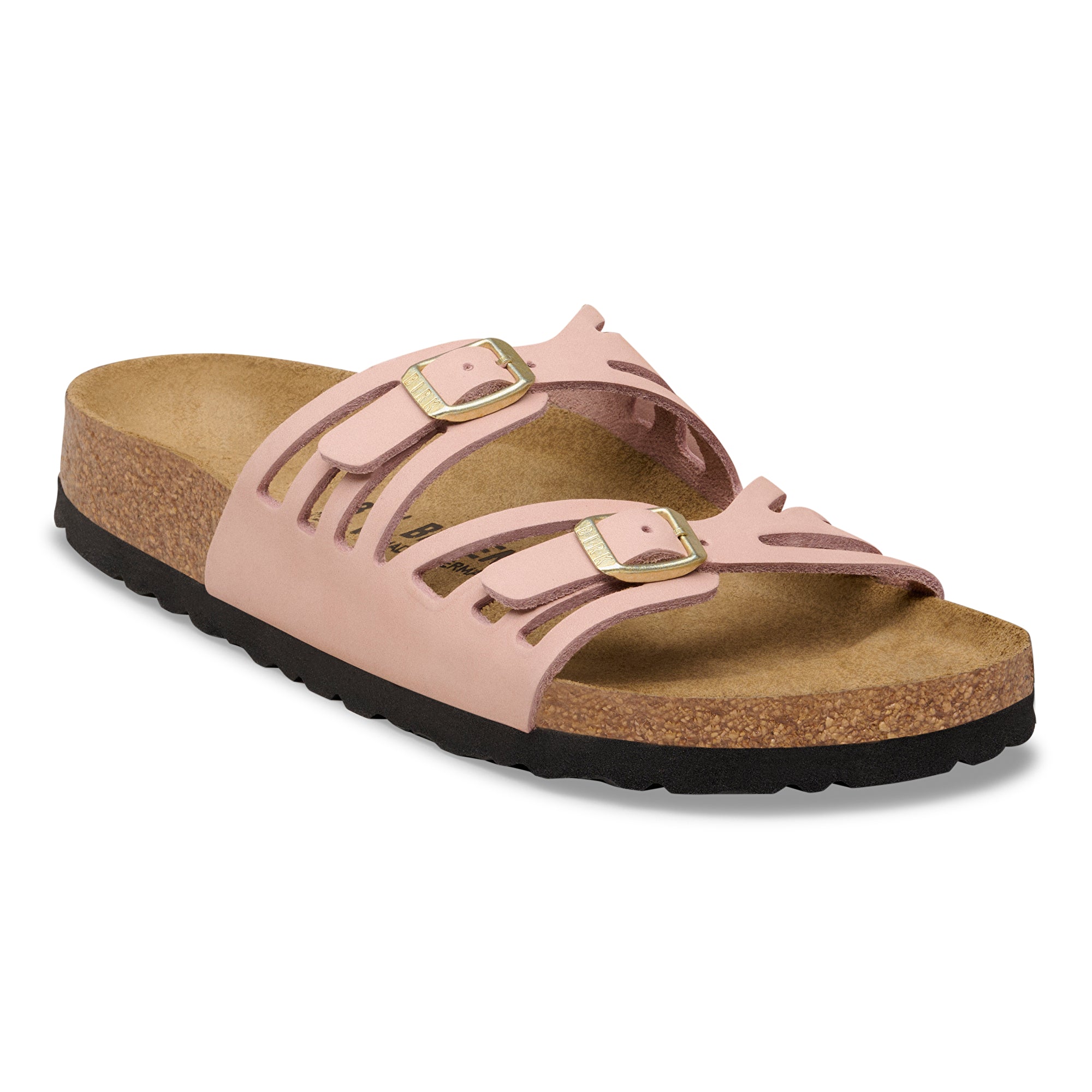 Pink sandal with gold buckles on a white background