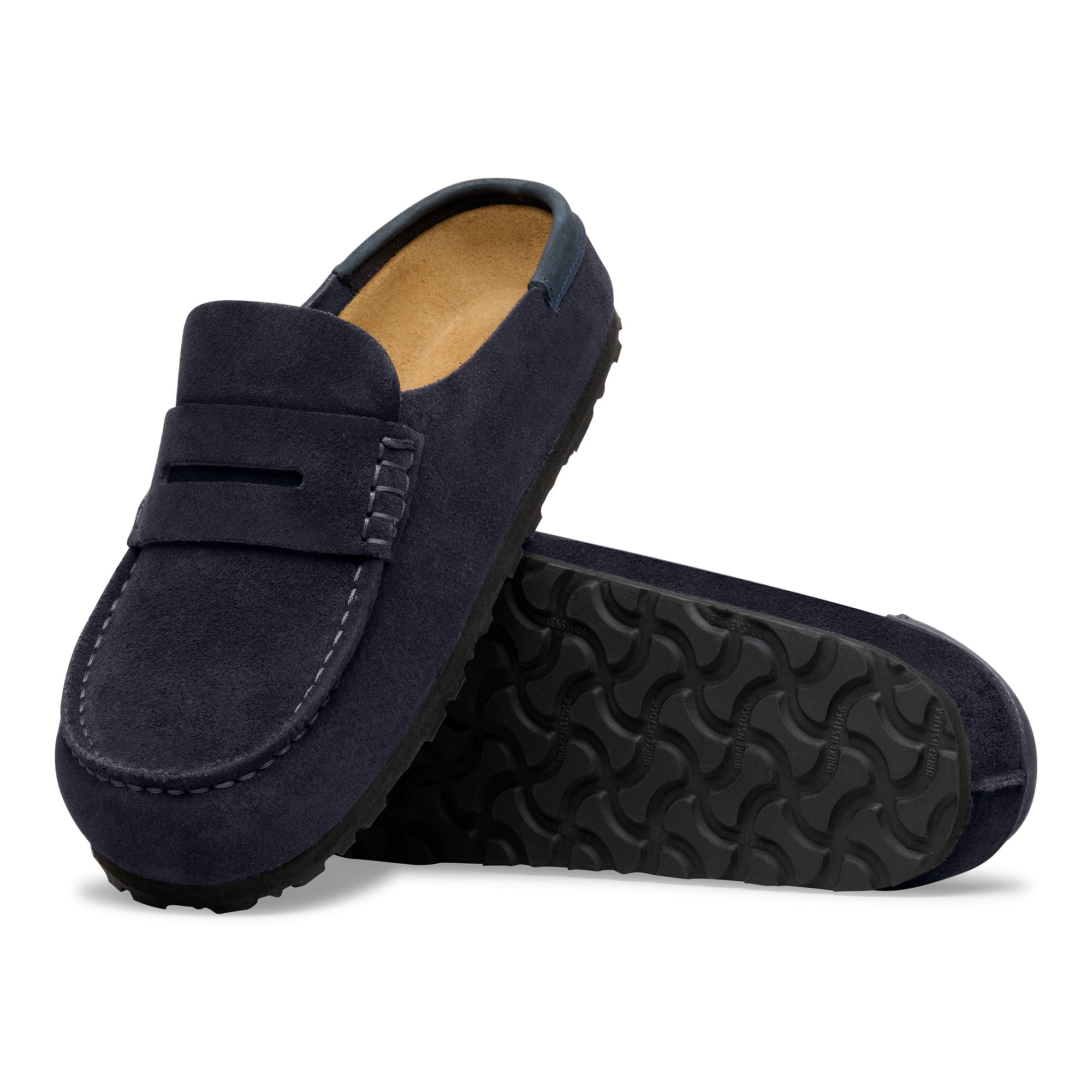 Navy blue loafers with a textured sole on a white background