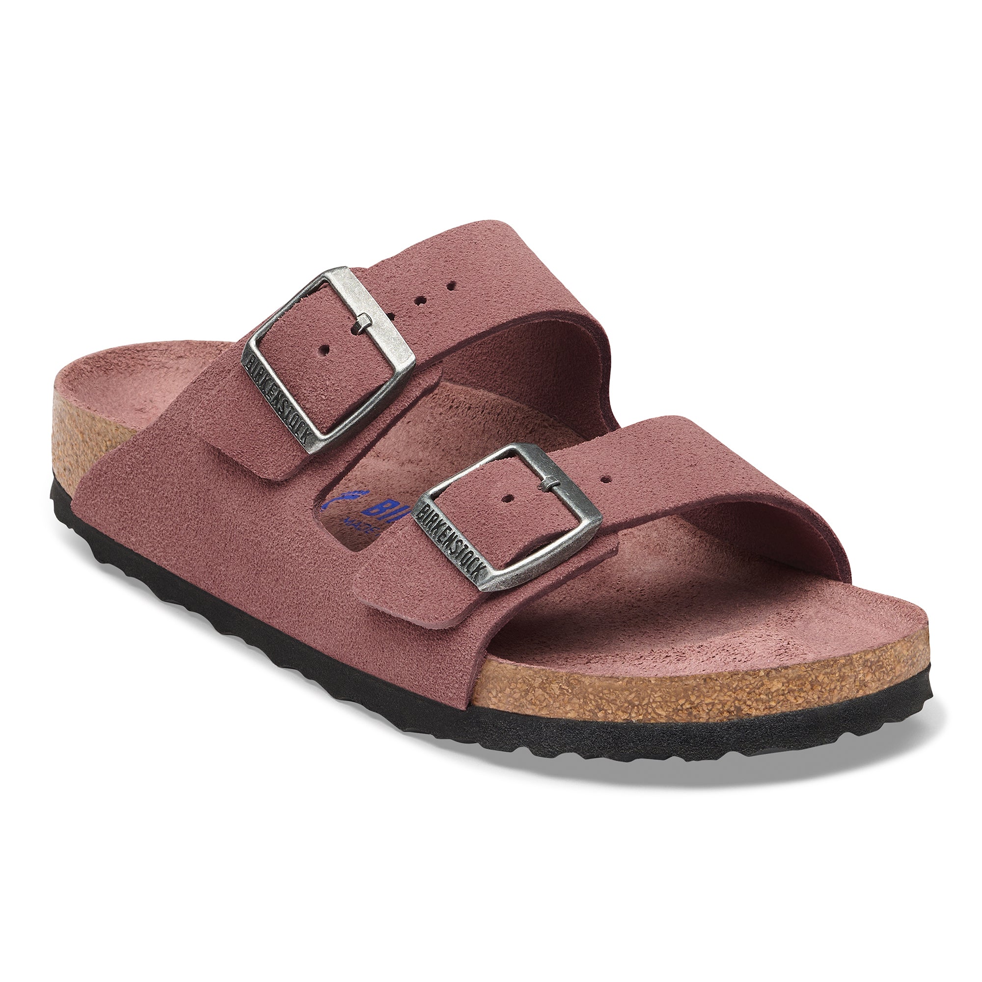 Pink sandal with cork sole on a white background