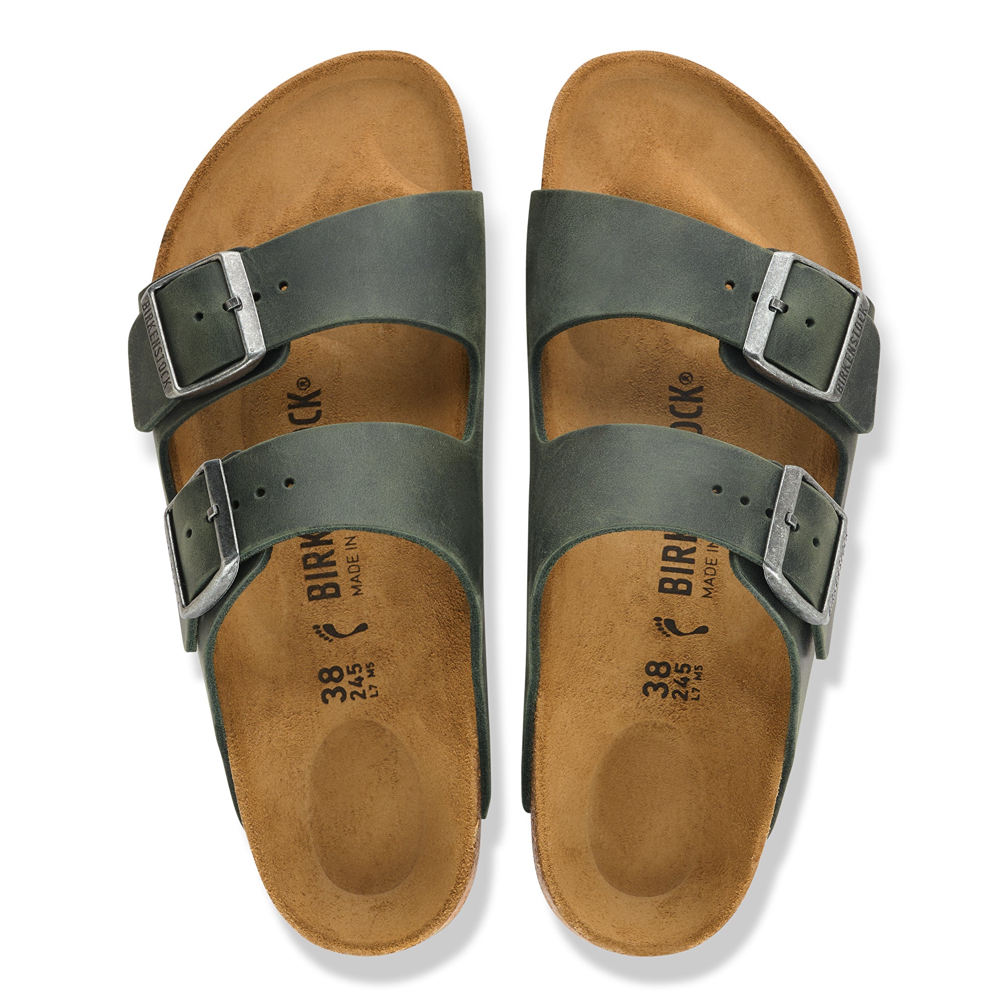 Pair of Birkenstock sandals with brown soles and green straps on a white background