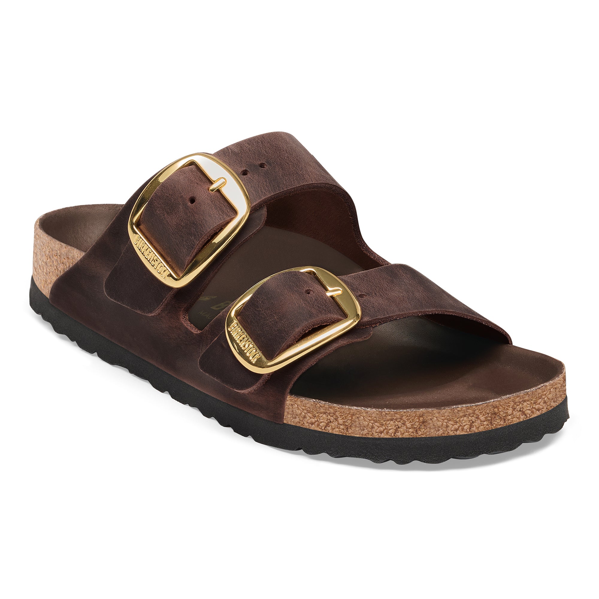 Brown sandal with gold buckles on a white background