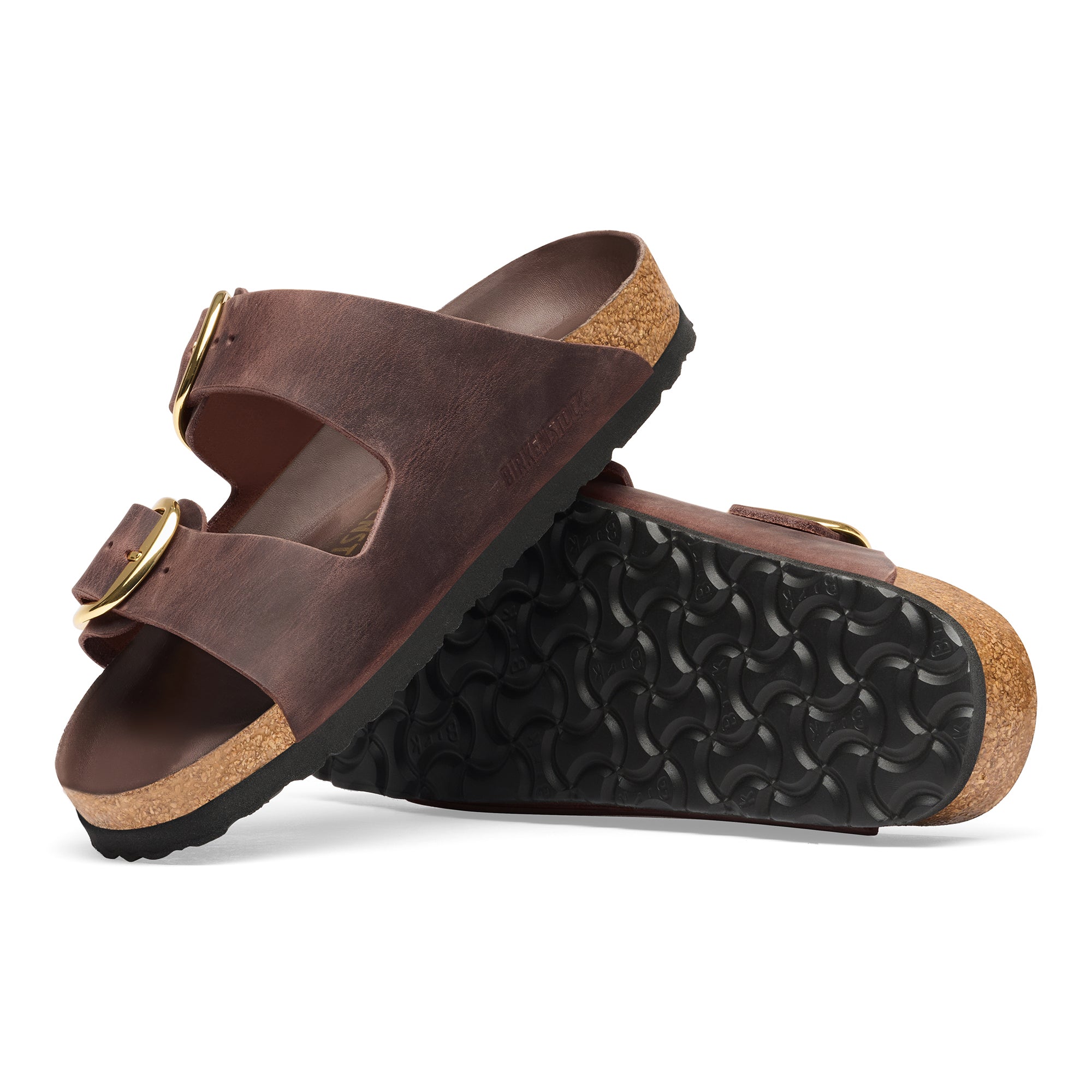 Brown sandals with cork sole on a white background