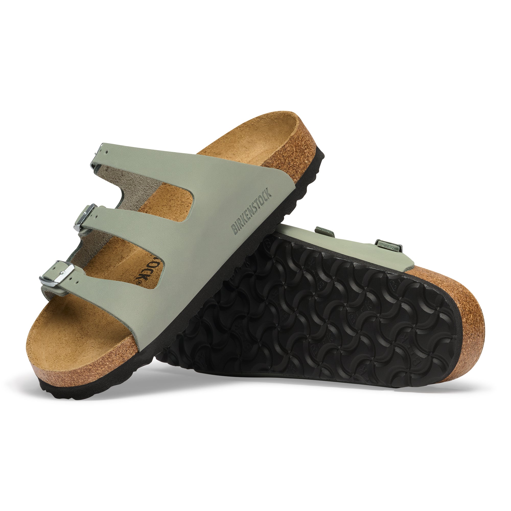 Pair of Birkenstock sandals with cork sole on a white background
