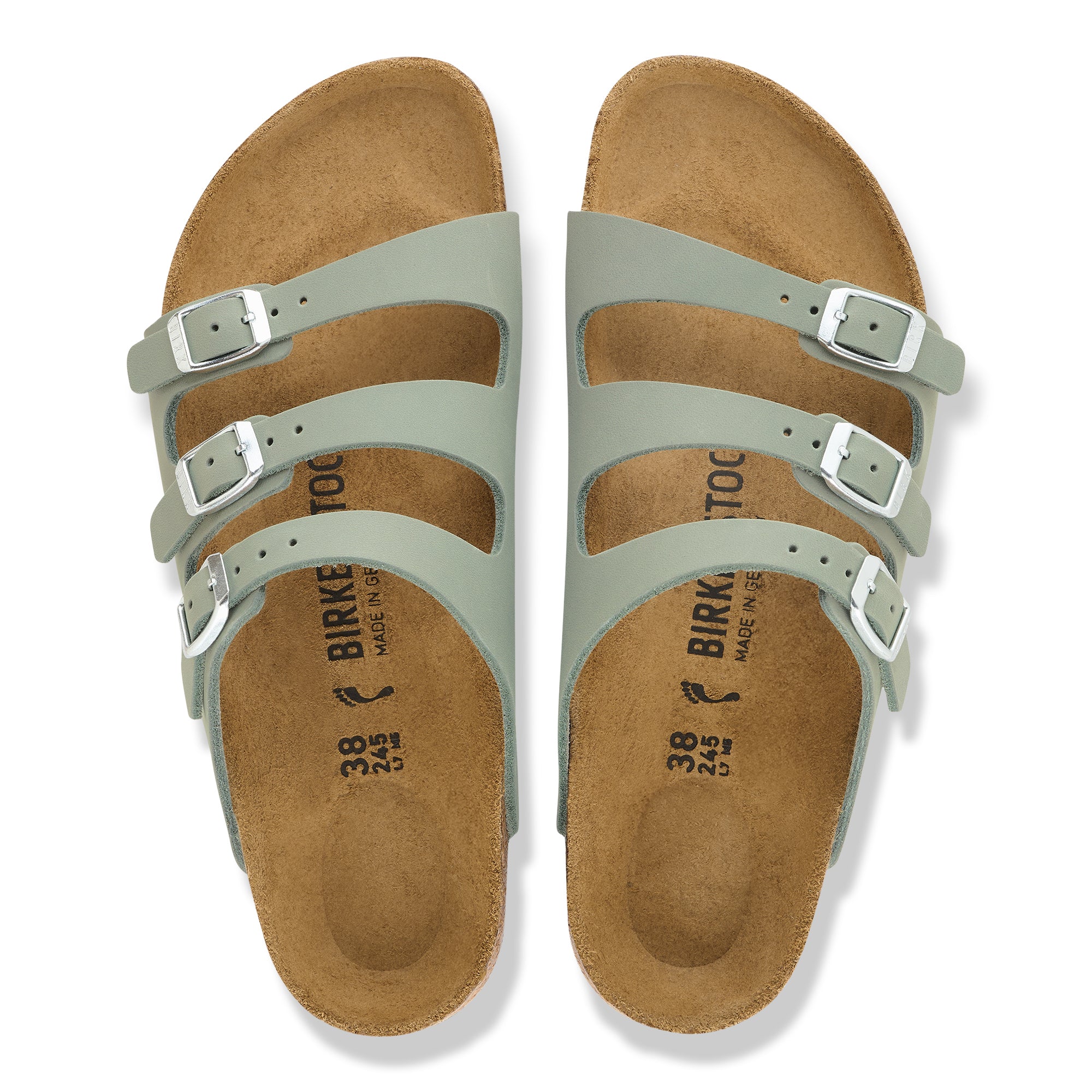Pair of Birkenstock sandals with green straps on a white background