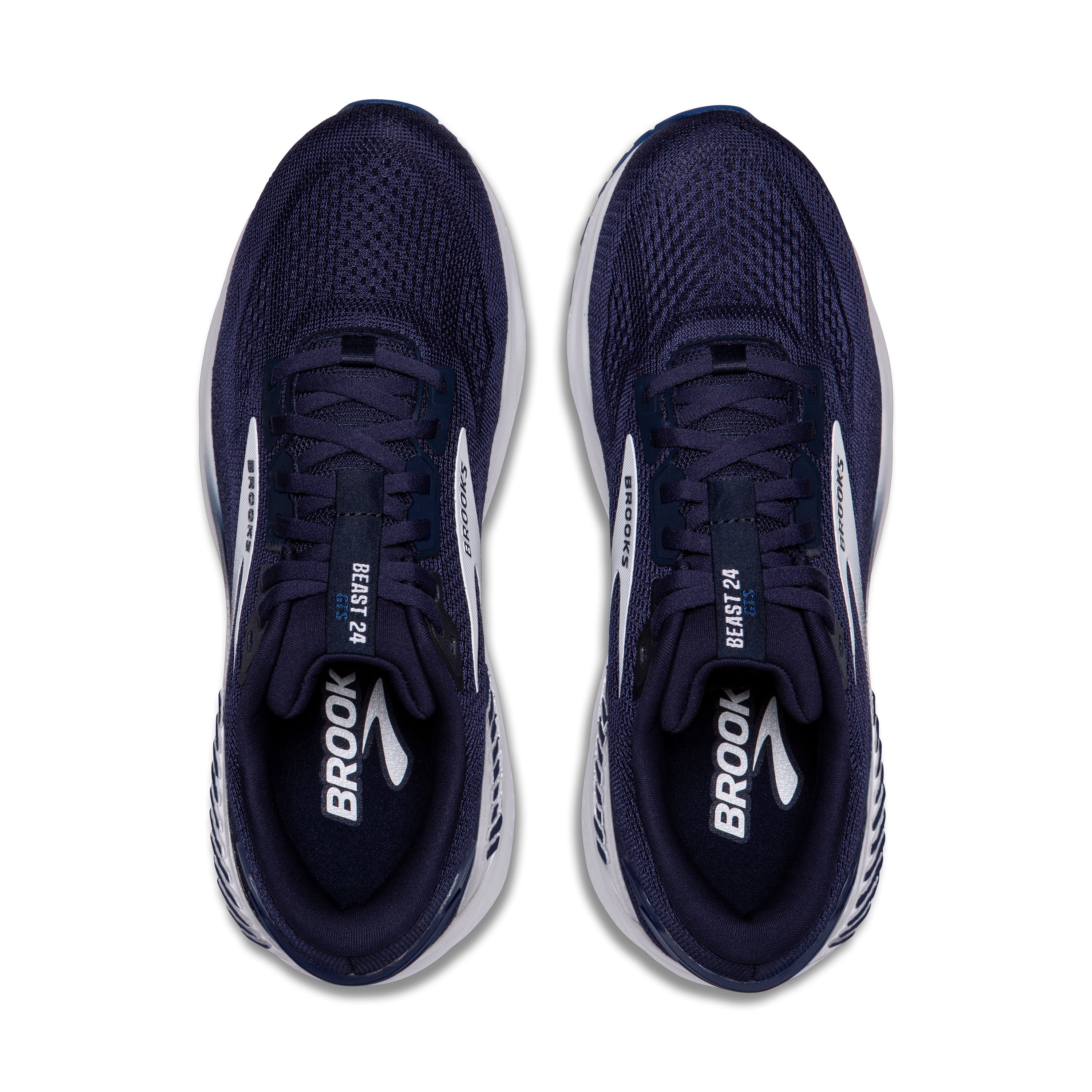 Navy running shoes with white accents on a white background