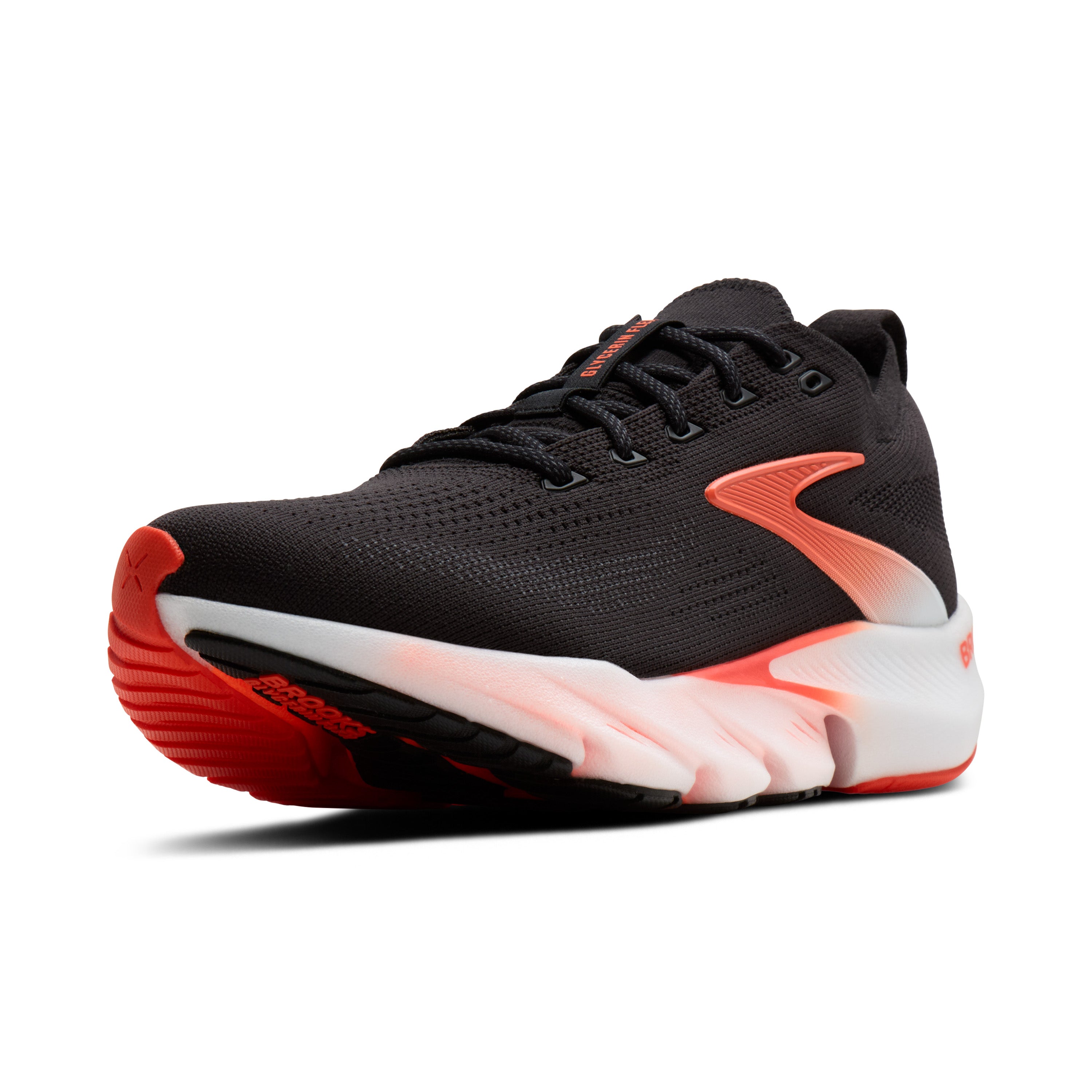Black and red athletic shoe on a white background