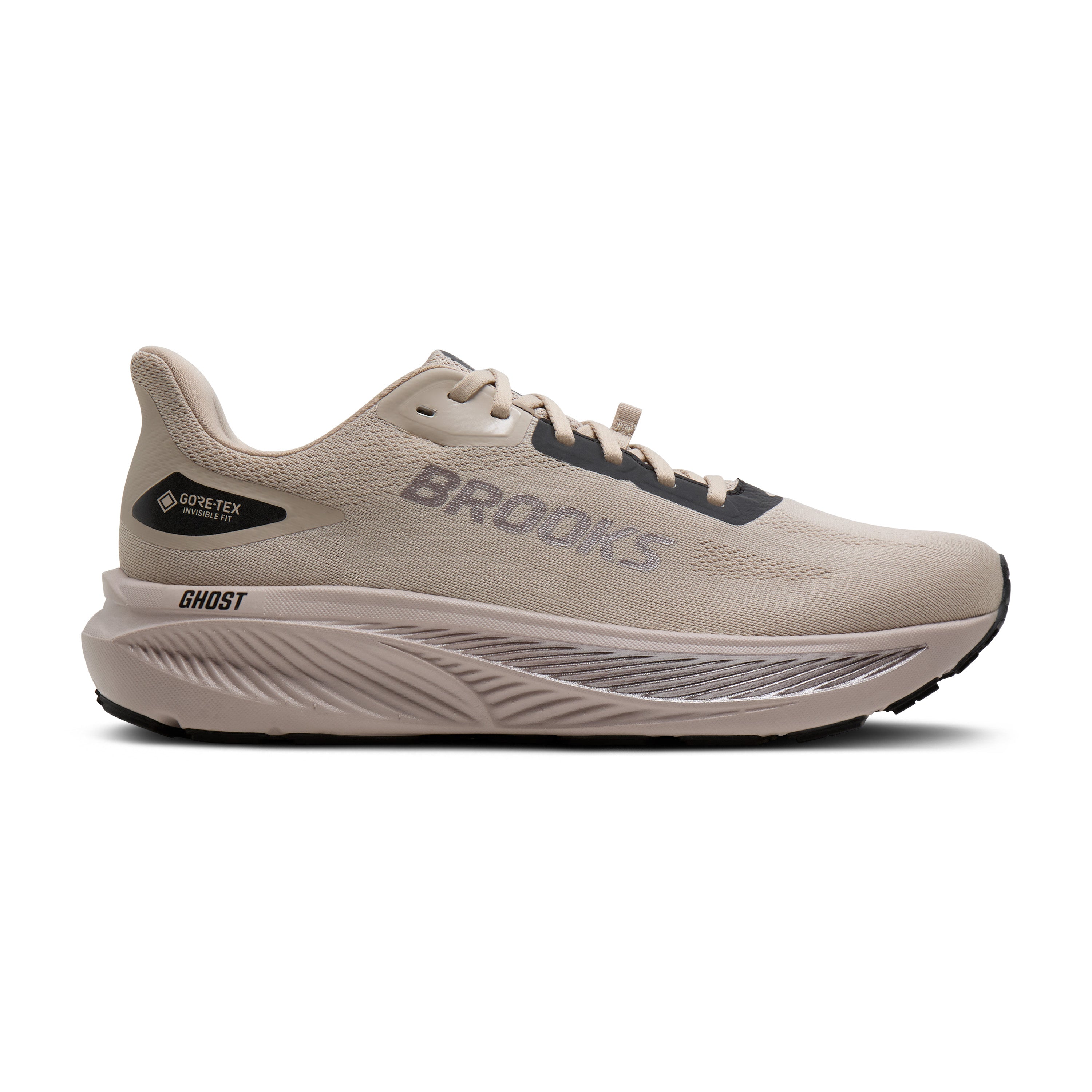 Gray athletic shoe with white sole on a white background