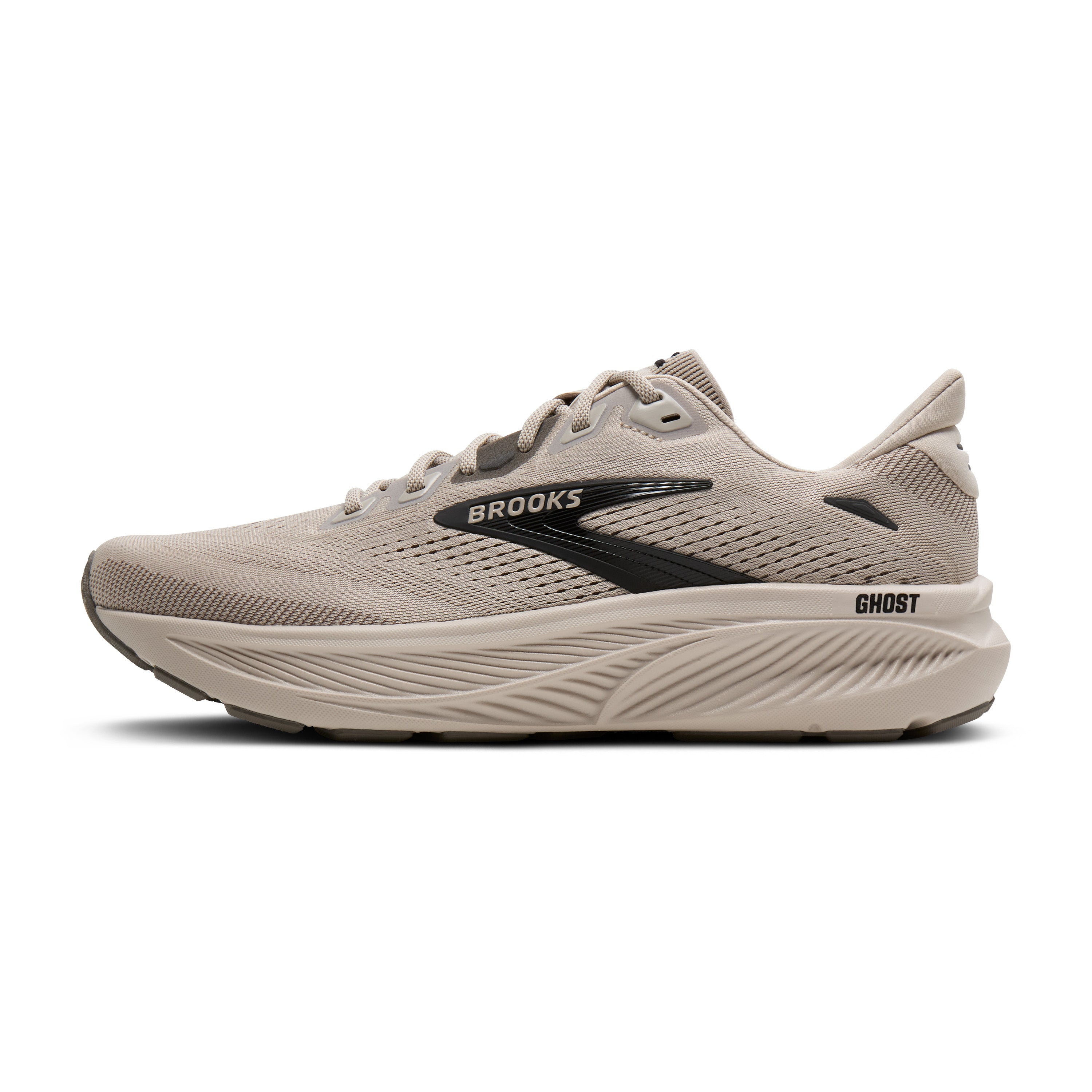 Brooks Ghost running shoe in a light taupe-beige colorway with a black side logo and black outsole edge, shown from a side profile on a white background.