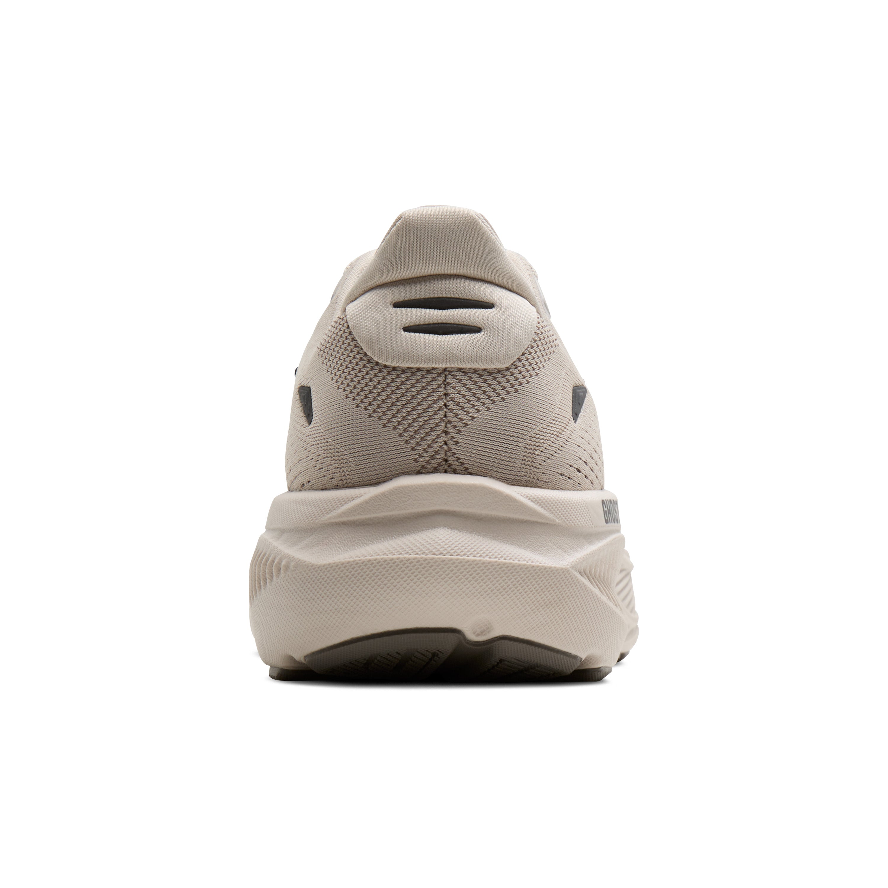 Beige running shoe on a white background