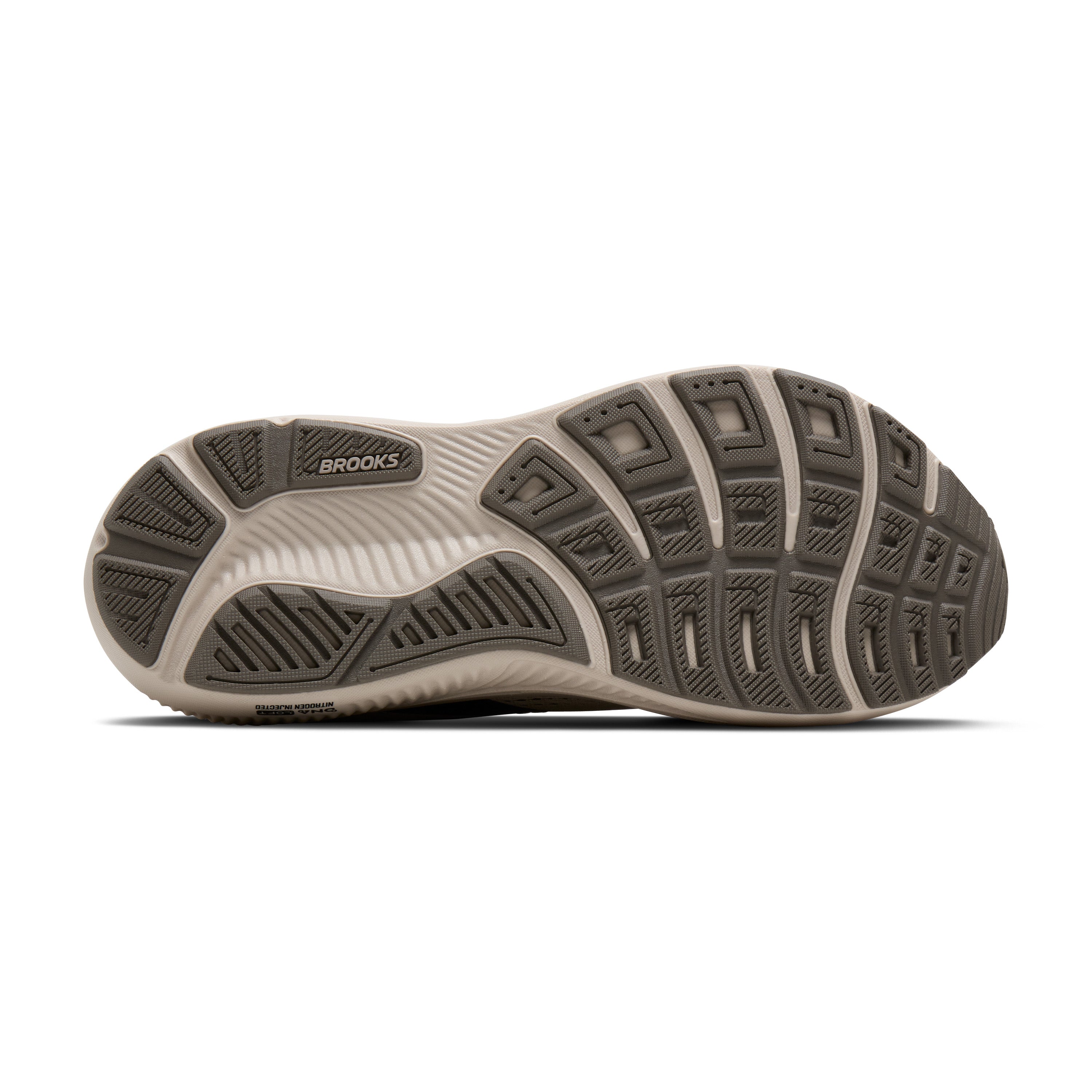 Sole of a shoe with brown and white sole design on a white background