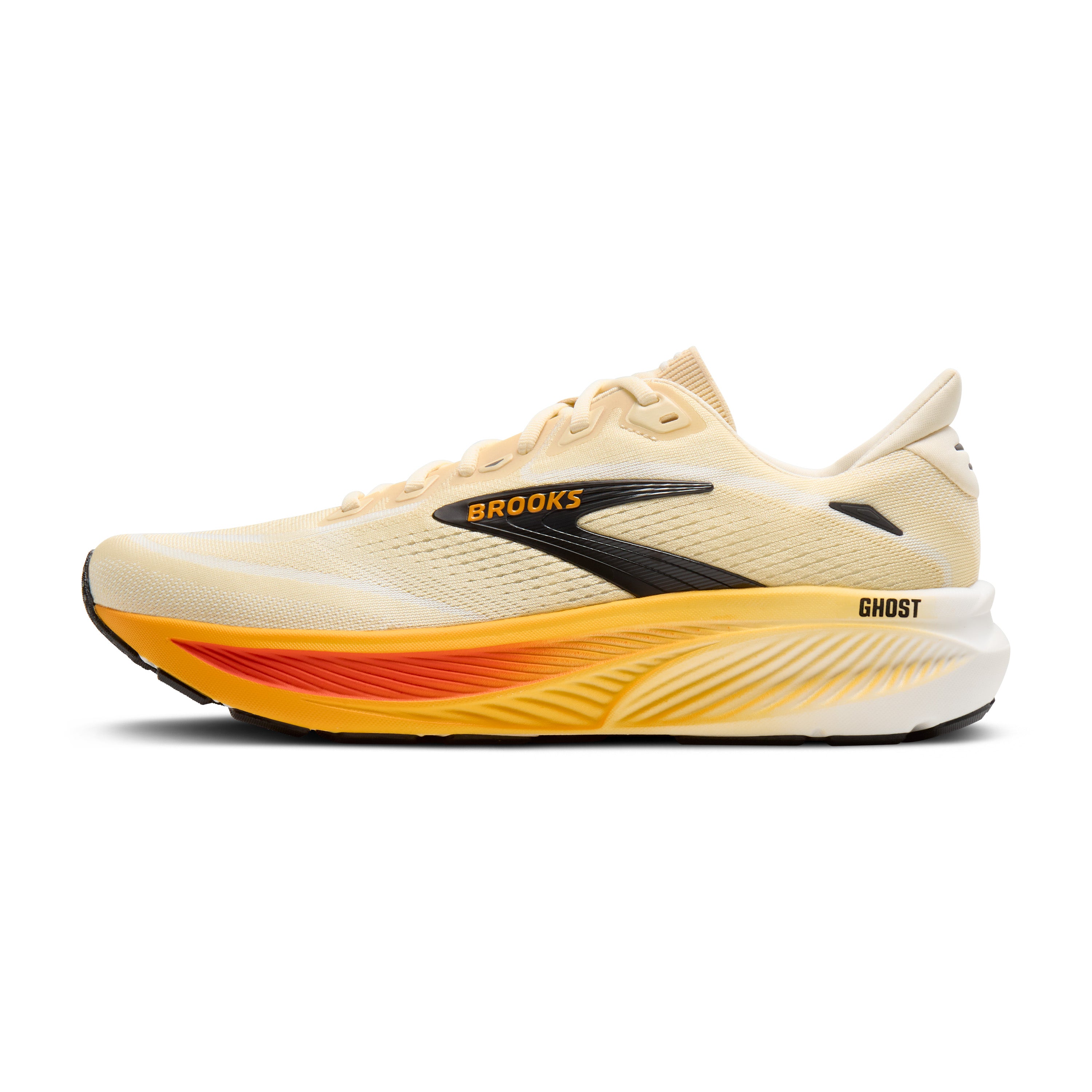 Beige running shoe with orange sole on a white background