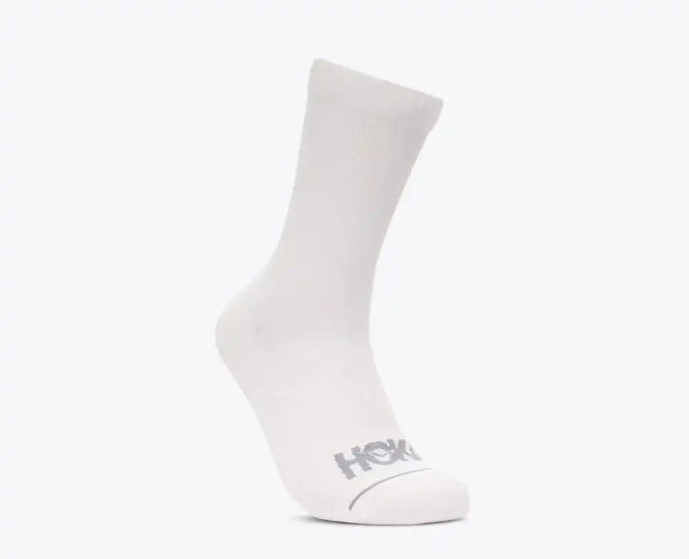 White sock with 'HOKA' branding on a white background