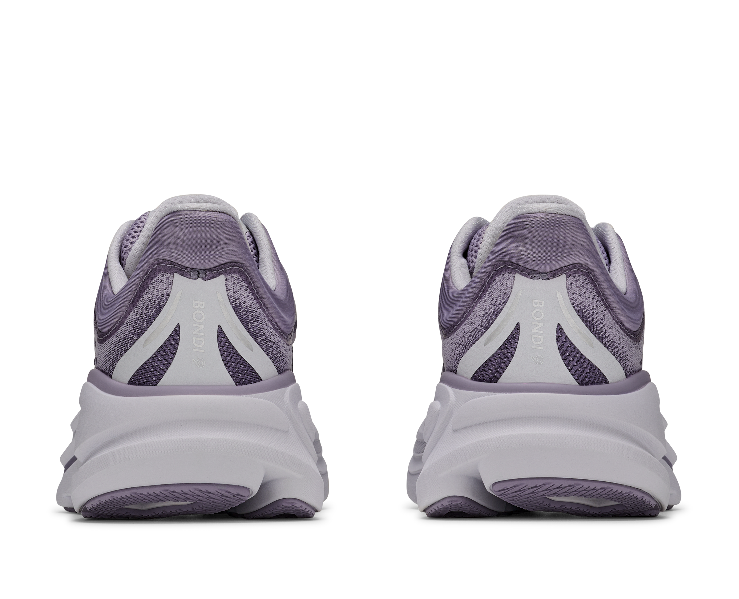 Pair of purple running shoes shown from the back on a white background