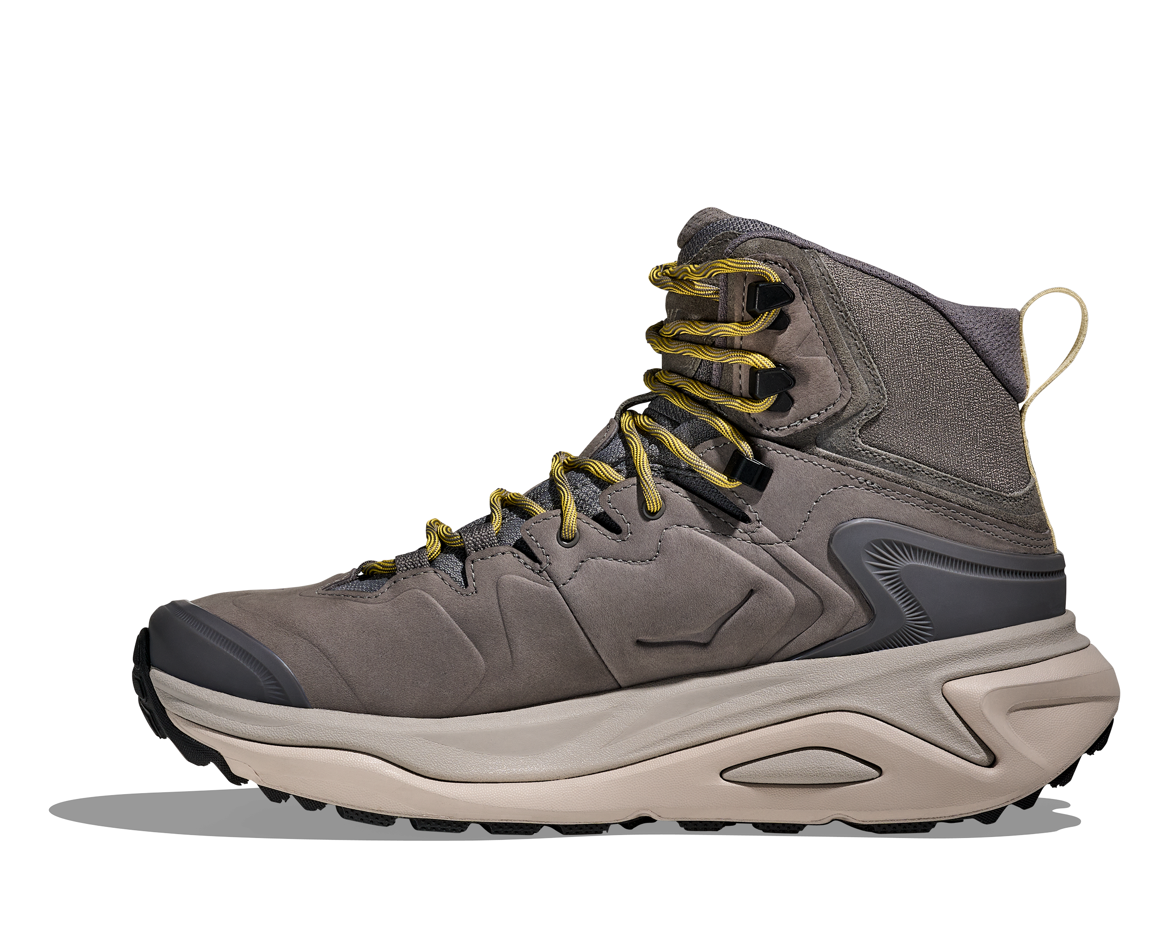 A mid-cut hiking boot in gray suede and synthetic materials, featuring mustard yellow laces, a beige midsole, and a black outsole, shown from a side profile on a white background.