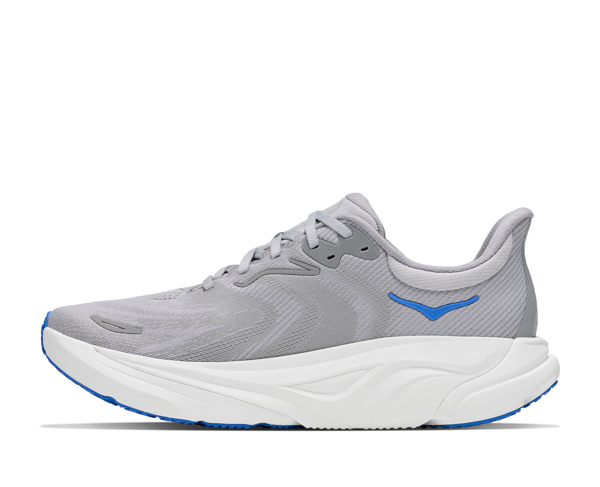 Gray running shoe with blue accents on a white background