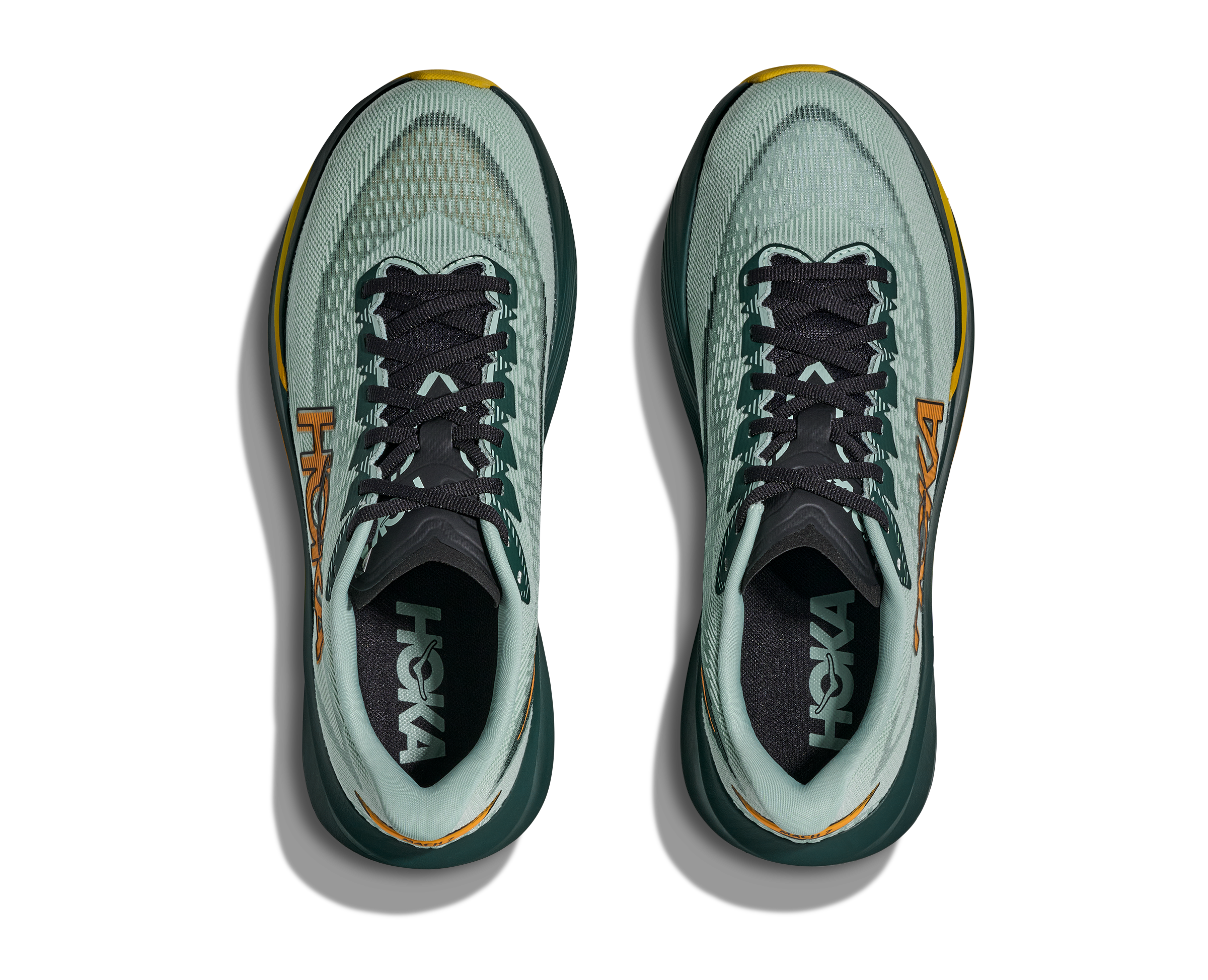 Pair of Hoka running shoes on a white background