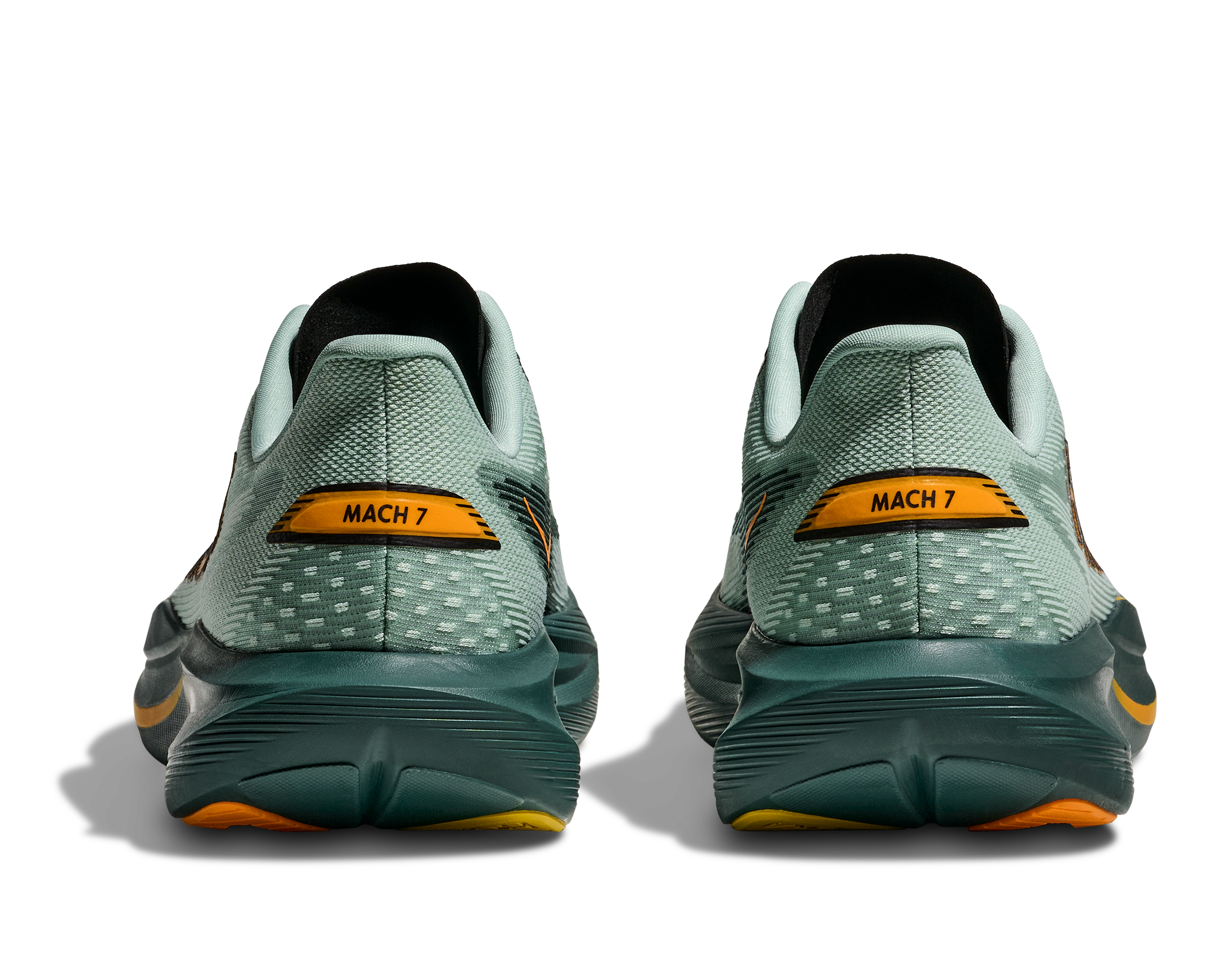 Pair of running shoes with 'MACH 7' label on a white background