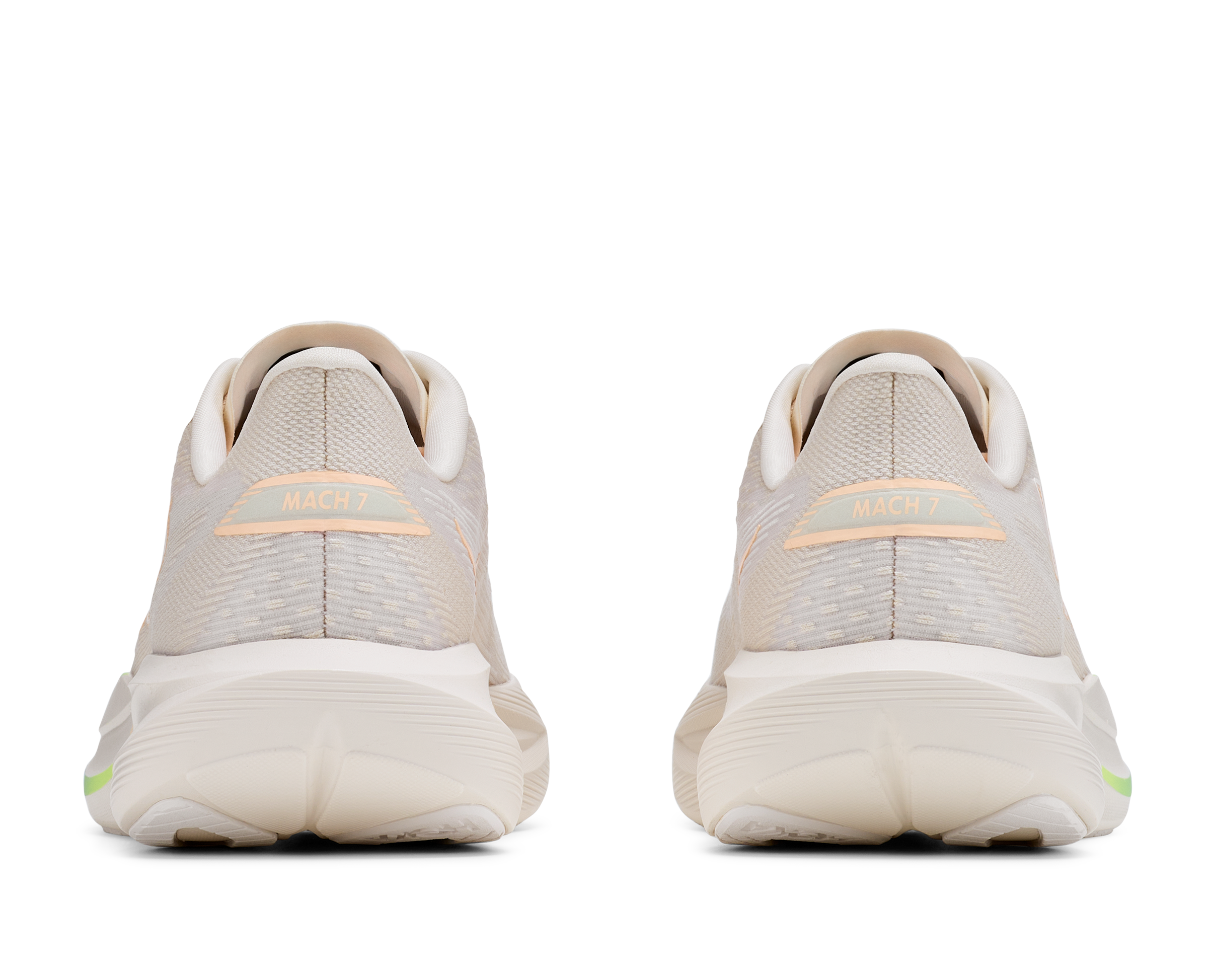 Pair of gray athletic shoes with a white sole on a white background