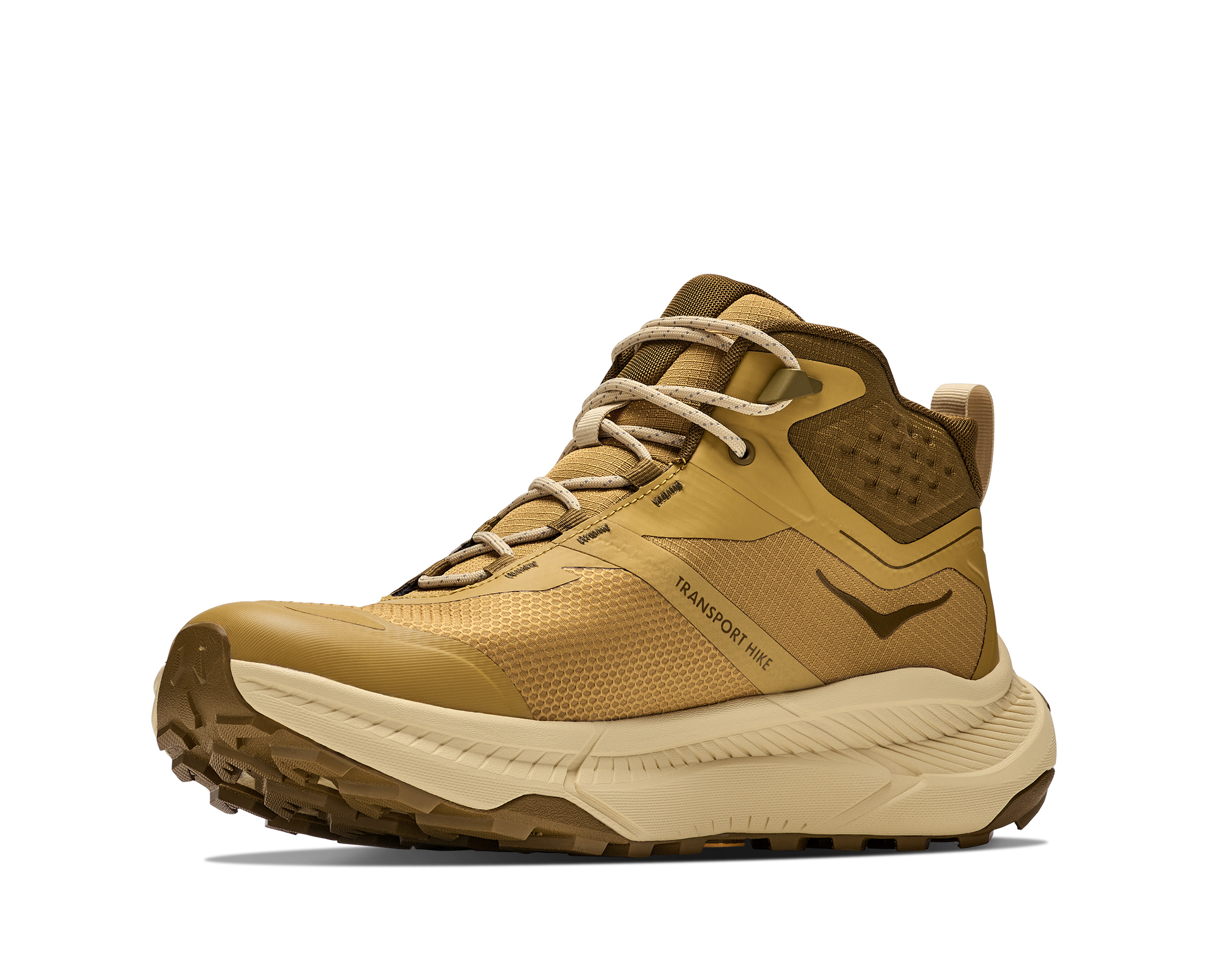 A mid-top hiking boot in a tan and brown colorway, featuring a textured mesh upper, lace-up closure, and a thick beige and brown sole, shown against a plain white background.
