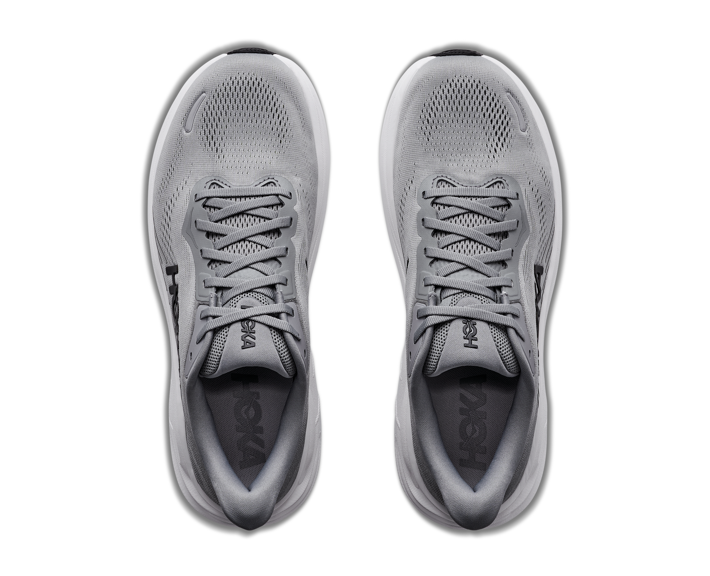 Gray running shoes with laces on a white background