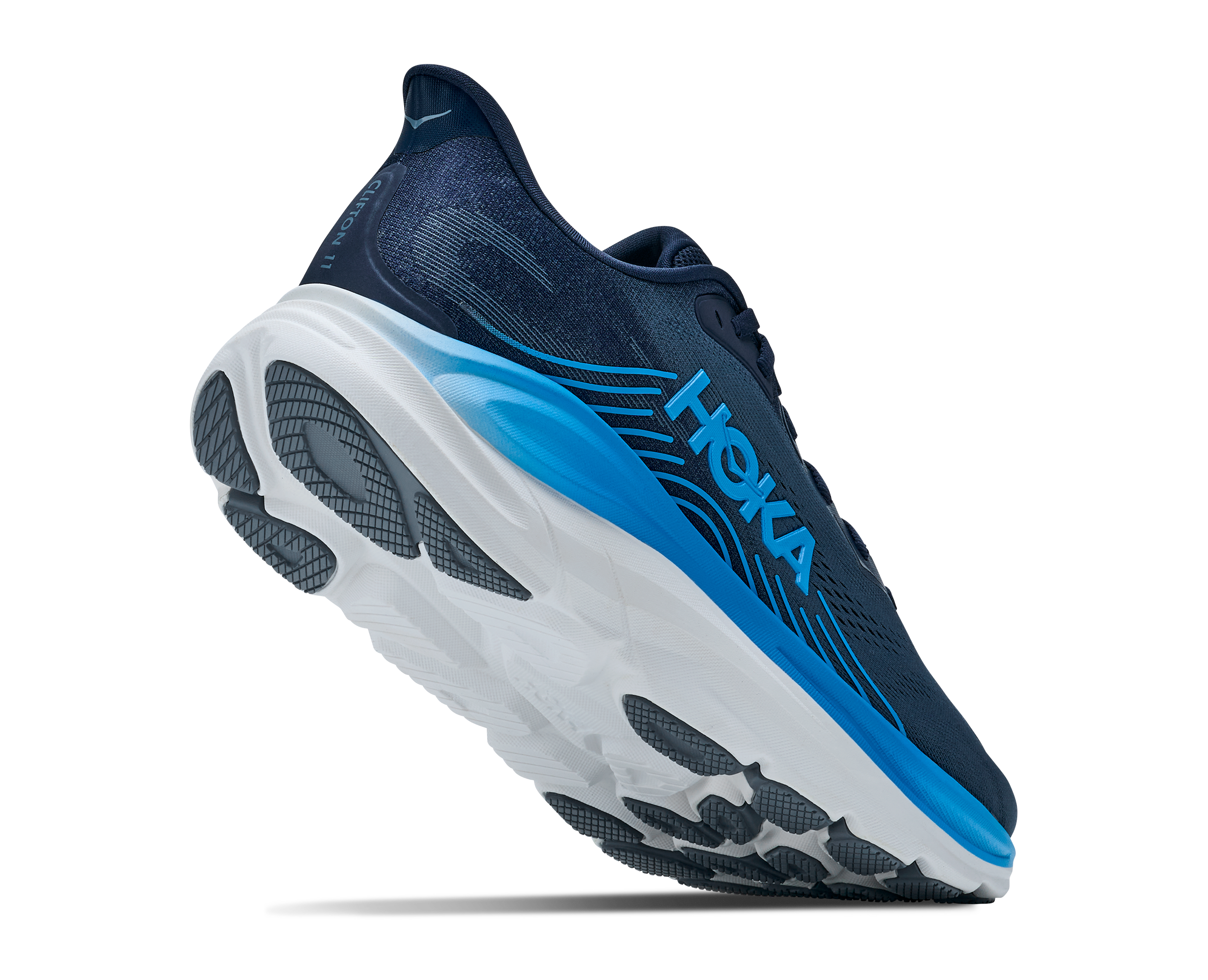 A HOKA running shoe in navy blue, white, and bright blue, shown from a three-quarters angle against a plain white background.
