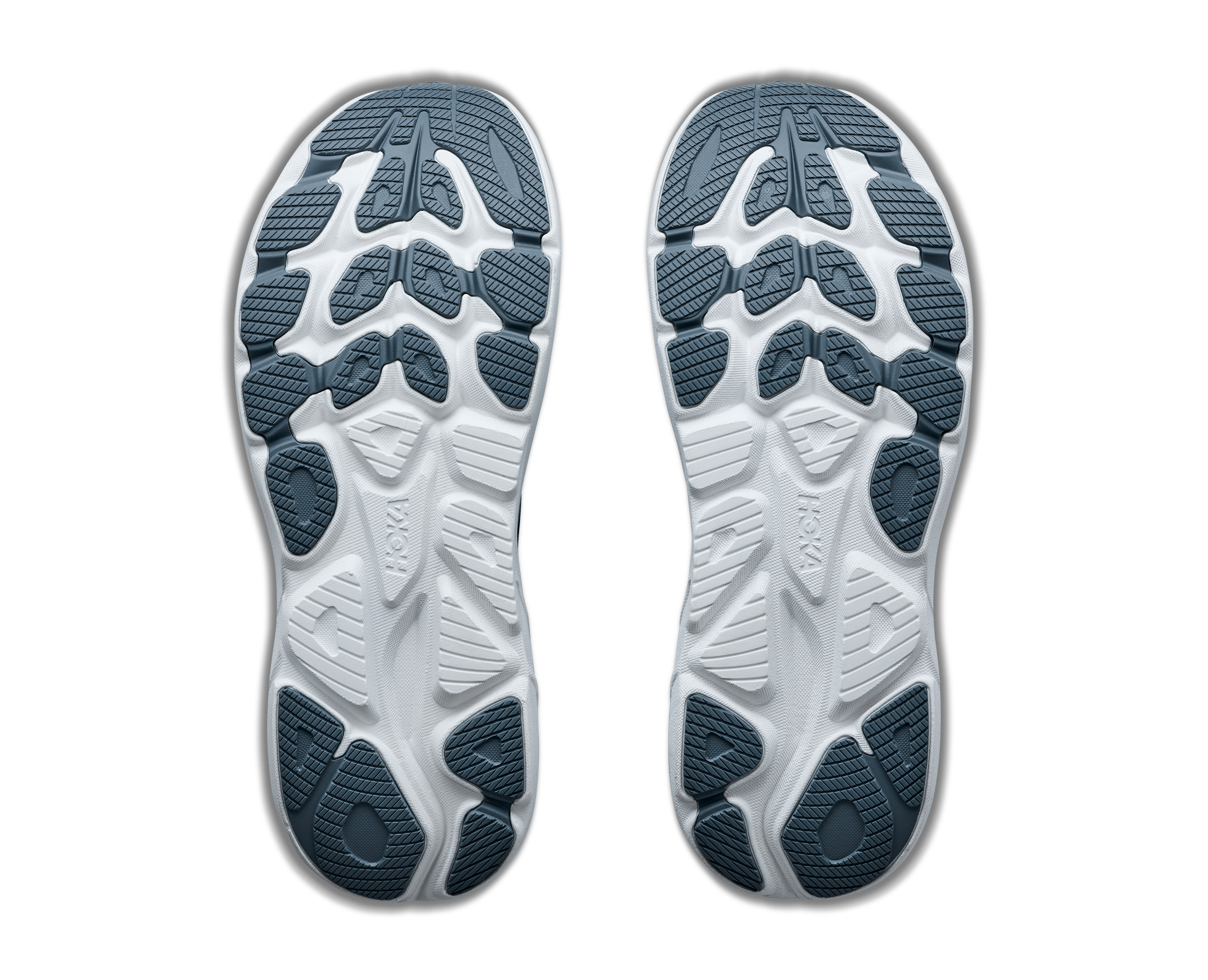 Close-up of the sole of a shoe with tread pattern on a black background