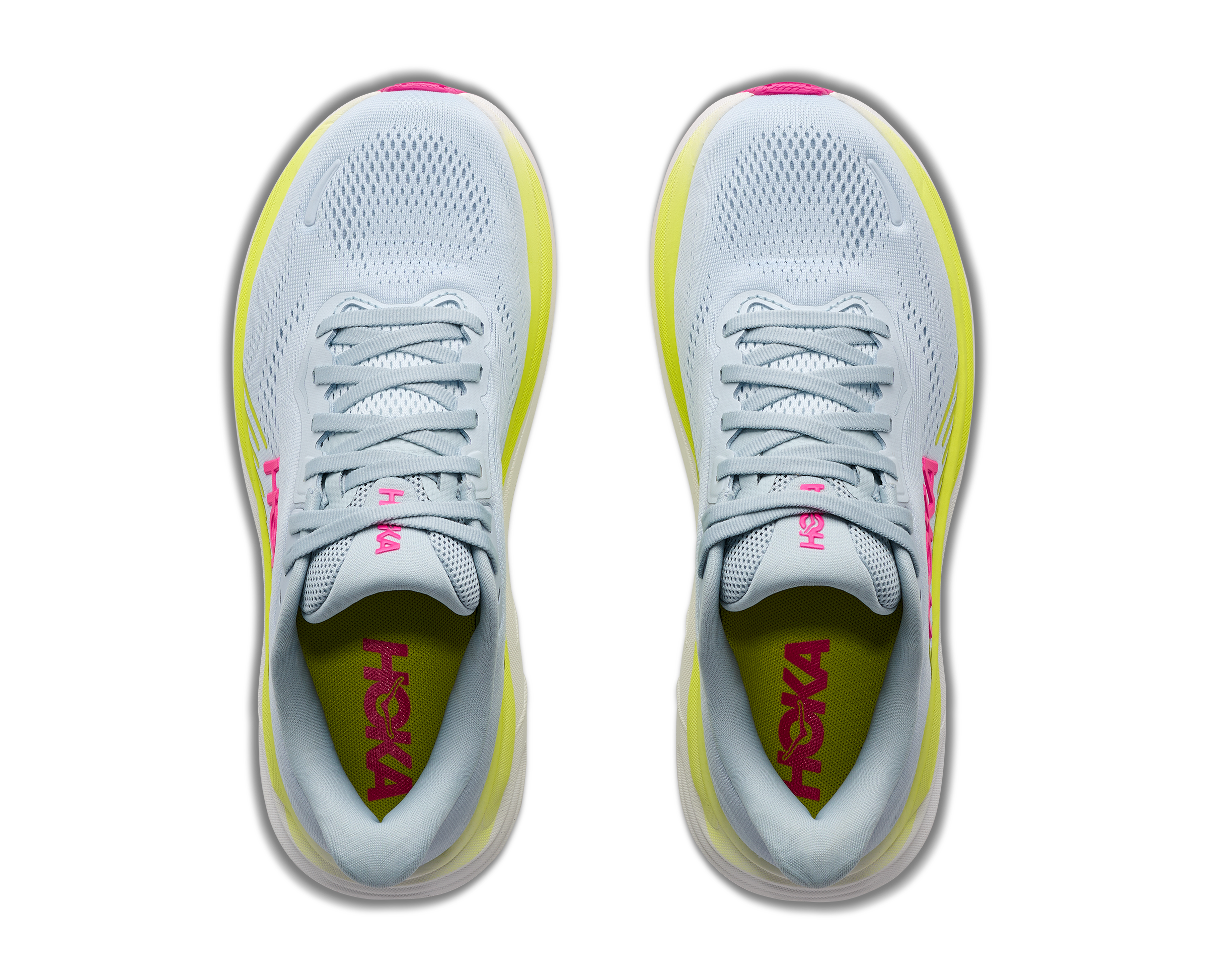Pair of gray running shoes with pink and yellow accents on a white background