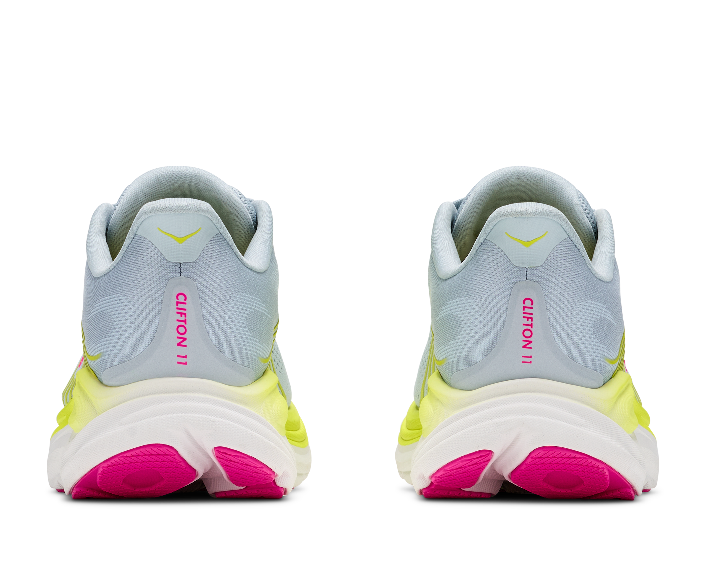 Pair of running shoes with gray, yellow, and pink design on a white background