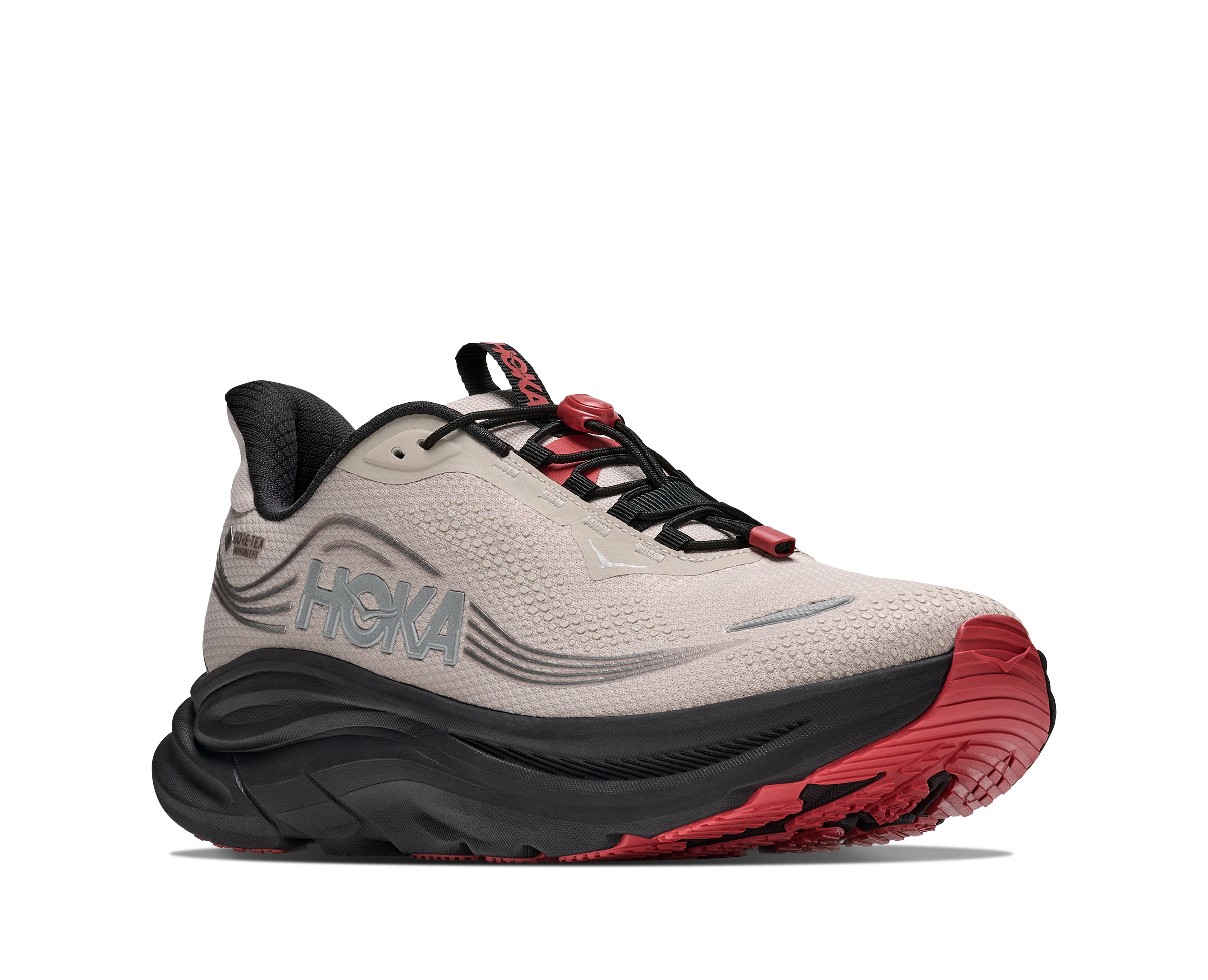 Hoka running shoe with beige, black, and red design on a white background