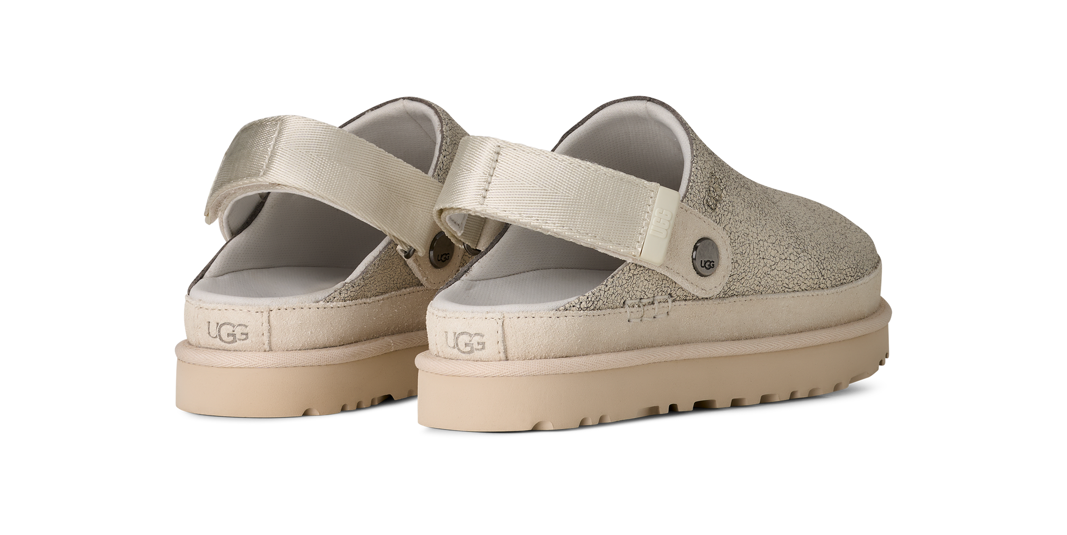 Beige sandals with UGG logo on a white background