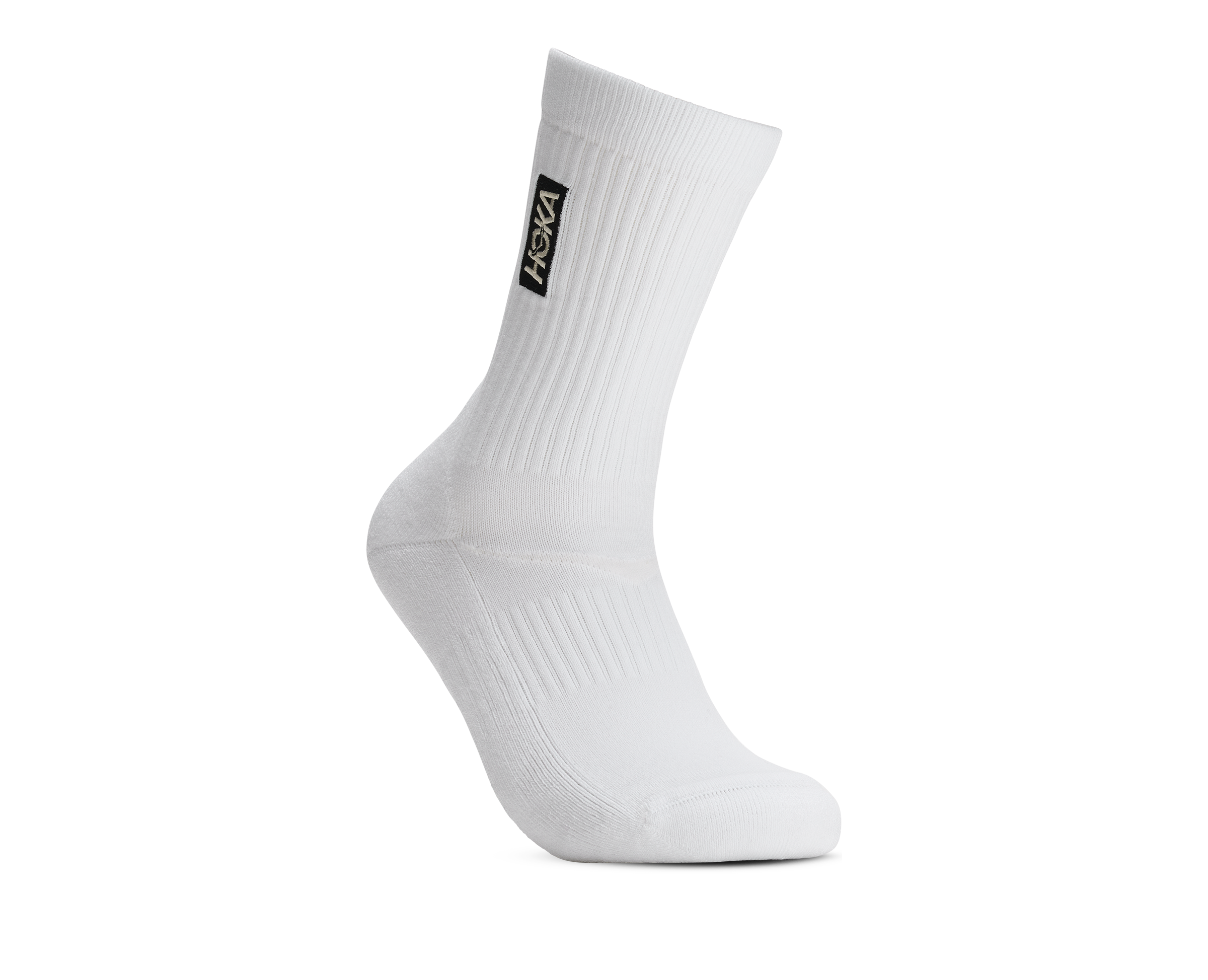 A single white crew sock with a black Vans logo patch on the side, shown on a clean white background.