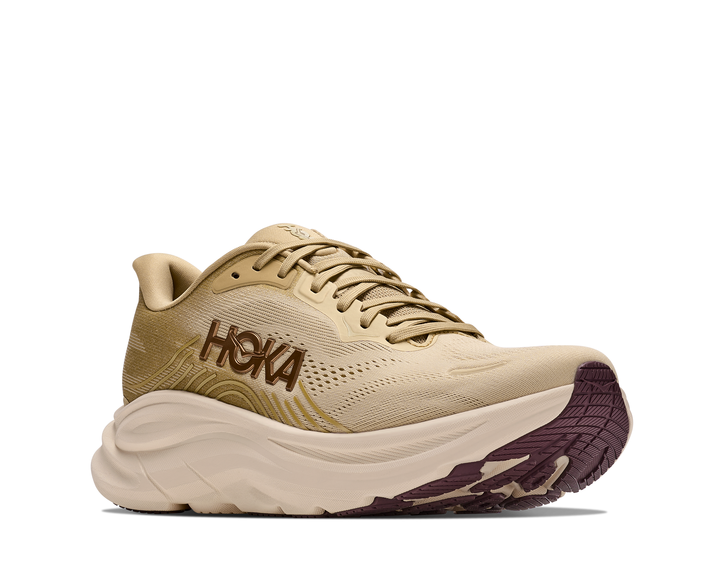 Beige running shoe with Hoka branding on a white background