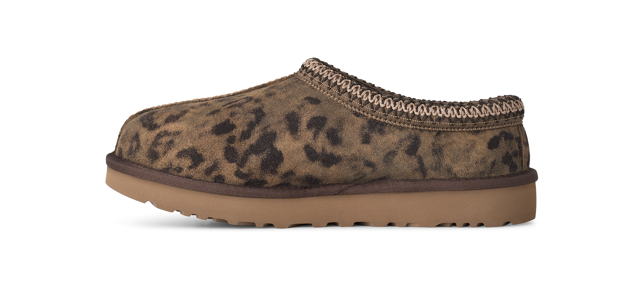 Brown leopard print slipper with a brown sole on a white background