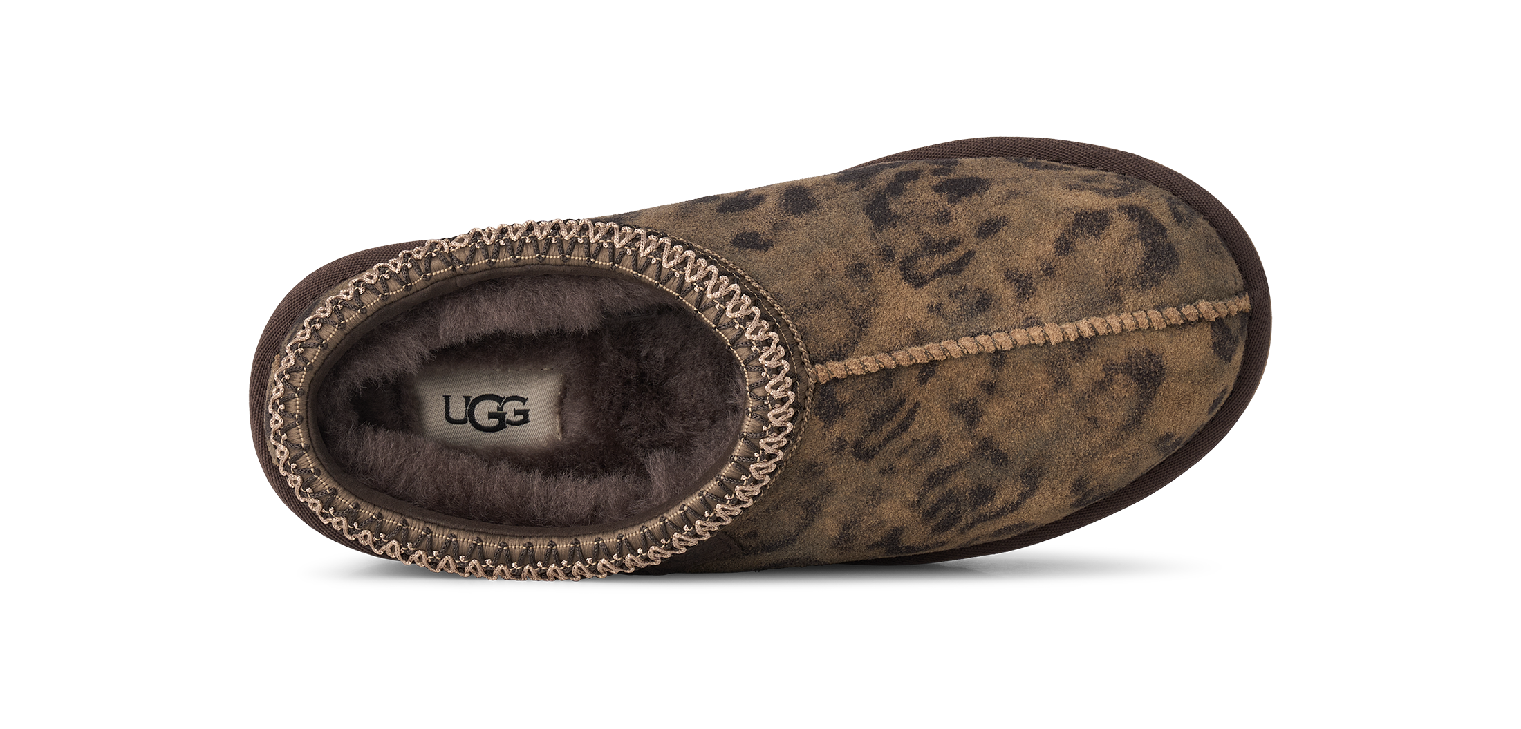 Brown leopard print UGG slipper on a white background
