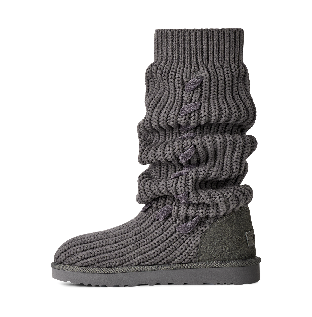 A single dark gray chunky knit slouch boot with a thick textured sole and a small dark green heel accent, shown from a side profile on a white background.