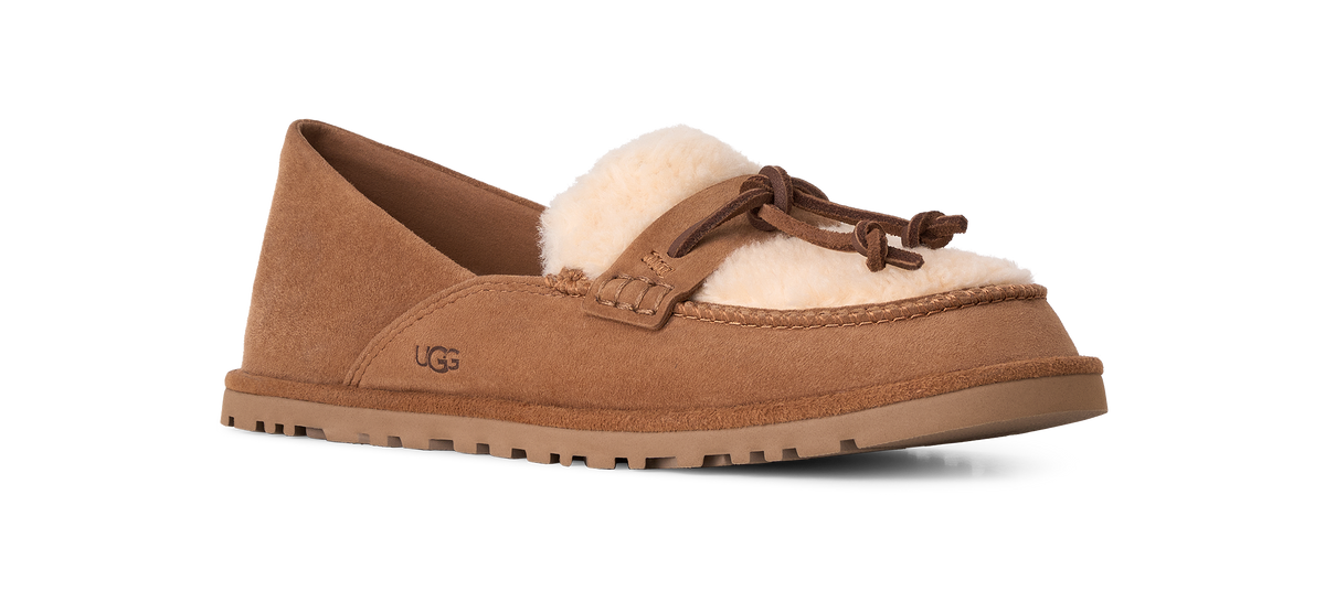 A single brown suede UGG slipper with a cream shearling lining and a matching brown leather drawstring, shown from a side profile on a white background.