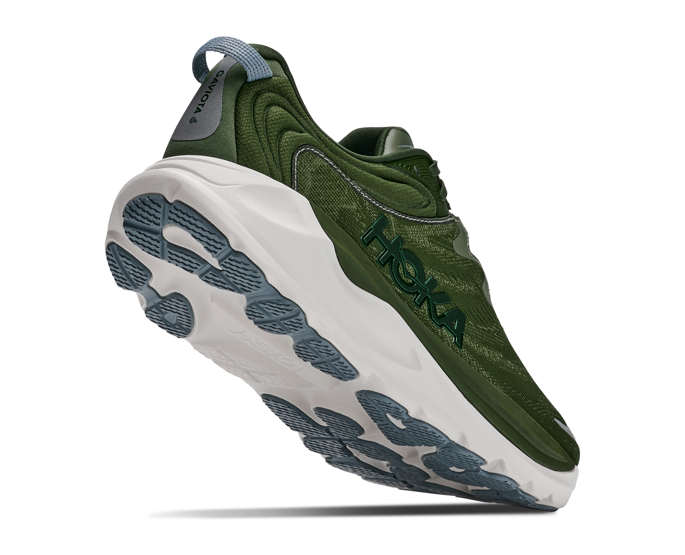 A Hoka running shoe in forest green and white, shown from a dynamic three-quarters angle against a solid white background.