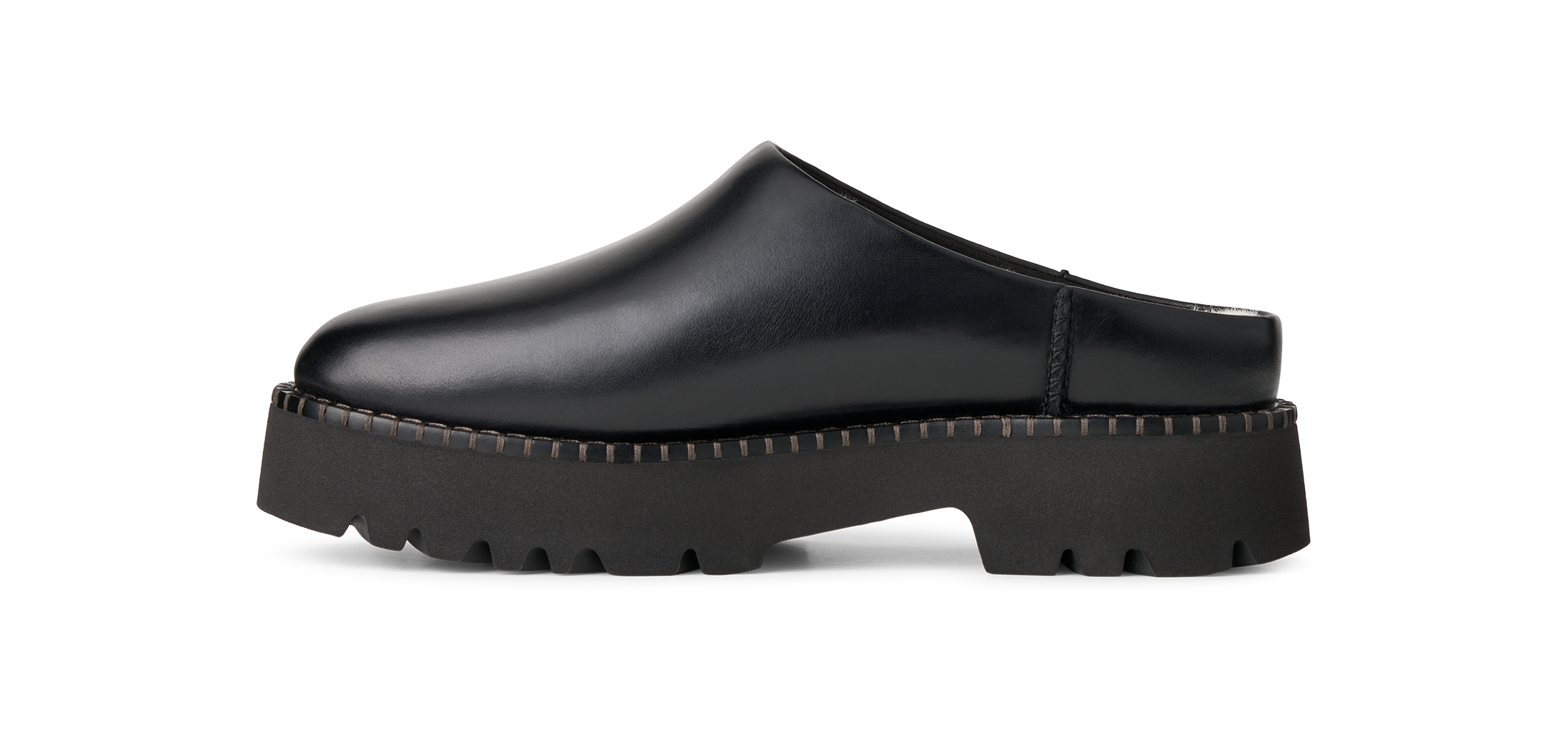 A single black leather clog shoe with a chunky lug sole, shown in a side profile on a white background.