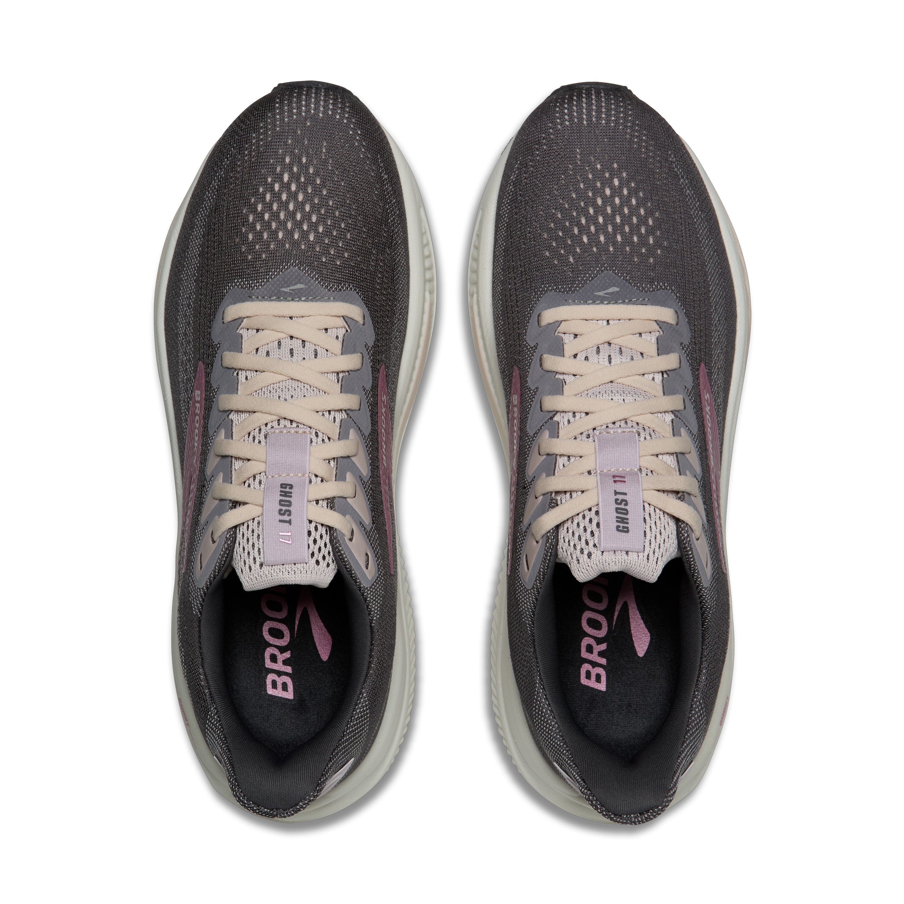 Pair of black and gray running shoes with white laces on a white background