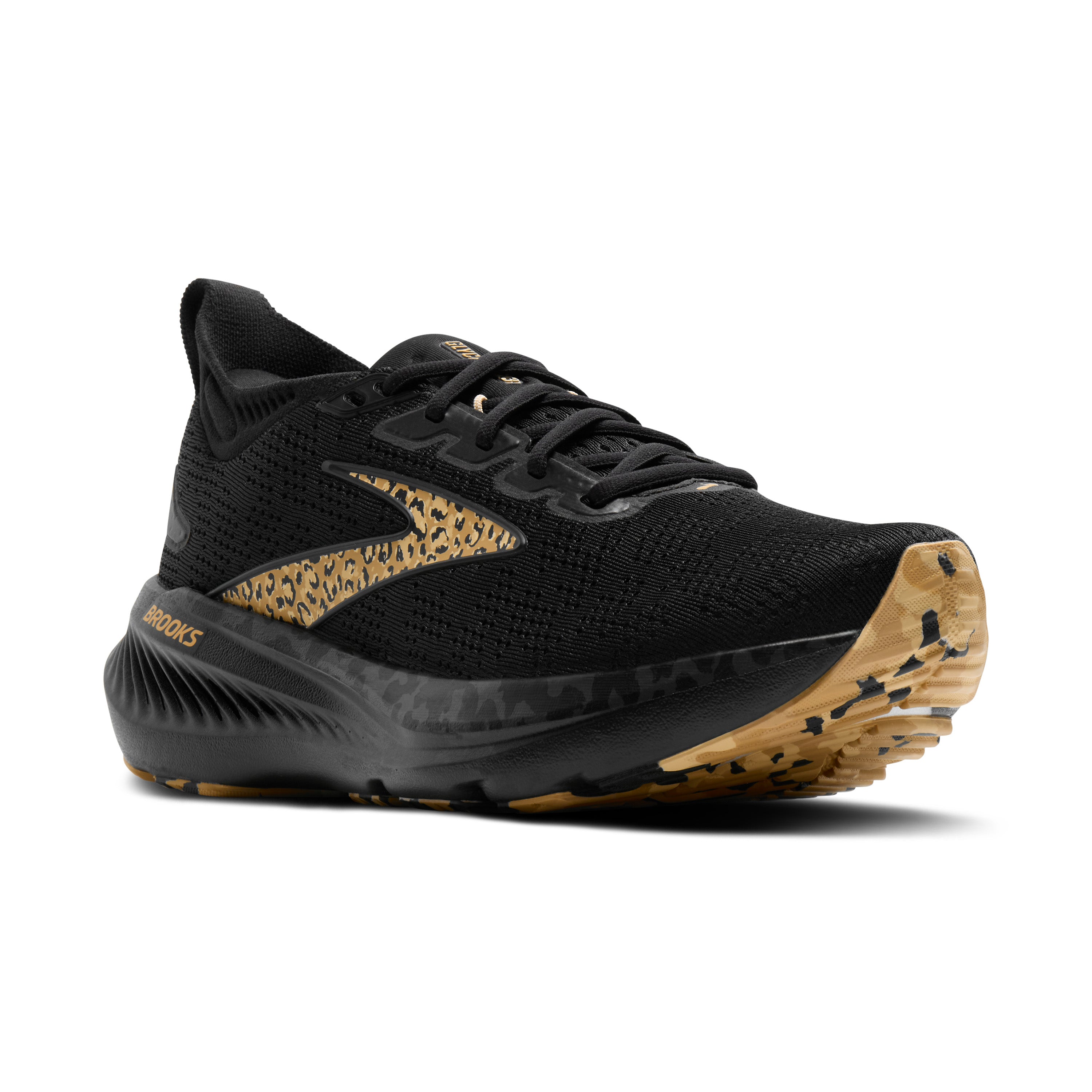 Black running shoe with gold accents on a white background