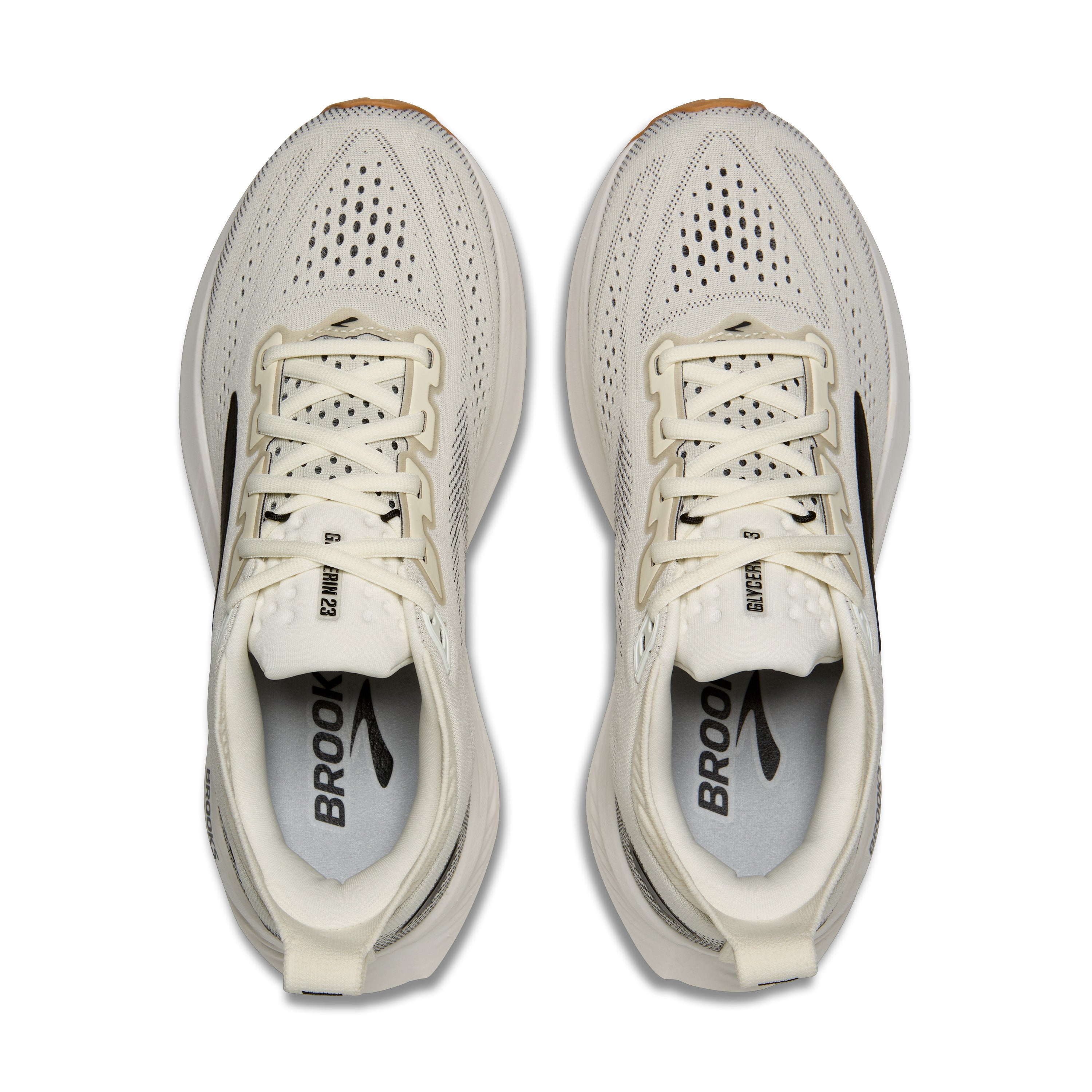 Pair of white running shoes with 'Brooks' branding on a white background